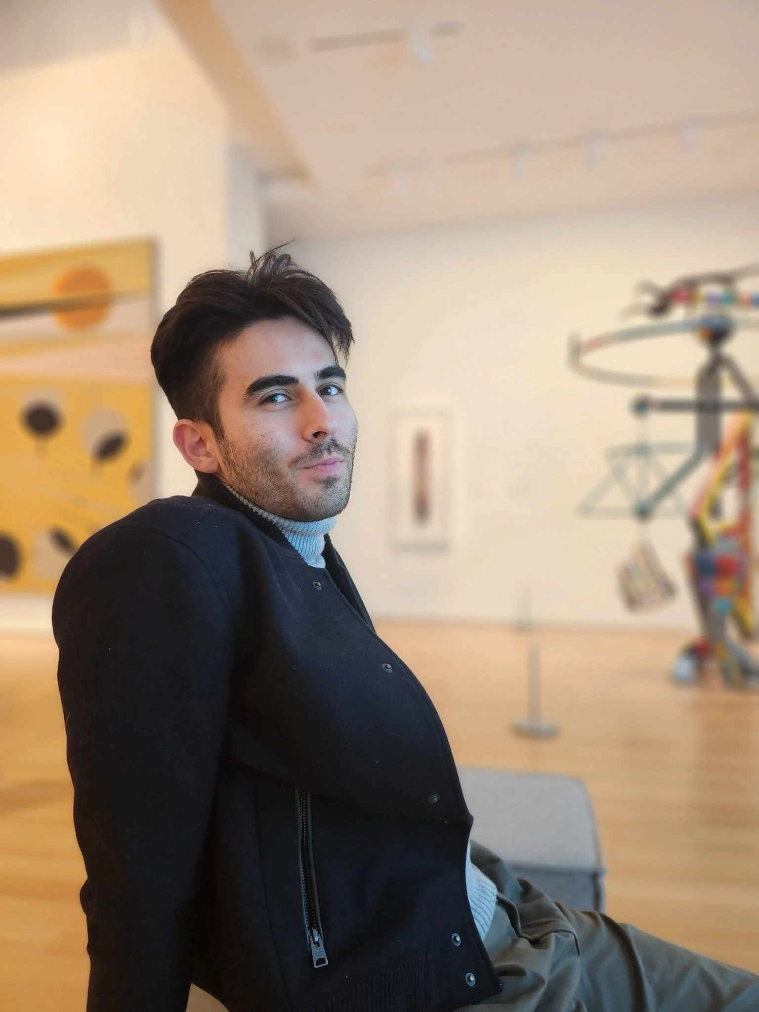 Richard Hornor, a wedding dance instructor based in San Francisco, sitting and smiling.