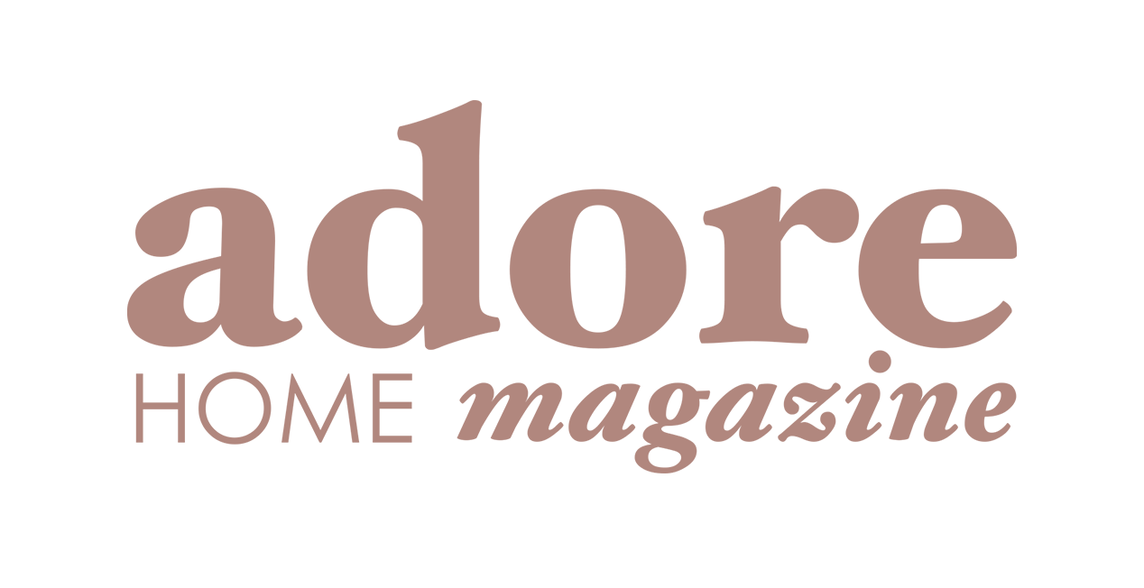 The logo for 'Adore Home Magazine' in brown and beige colors, featuring stylized text.