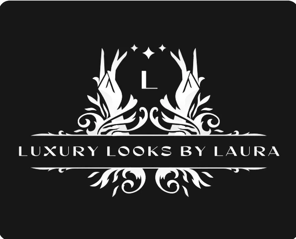 A black and white logo for 'Luxury Looks by Laura' featuring ornate design elements, two hands with long nails, a clock with the letter 'L', and stars.