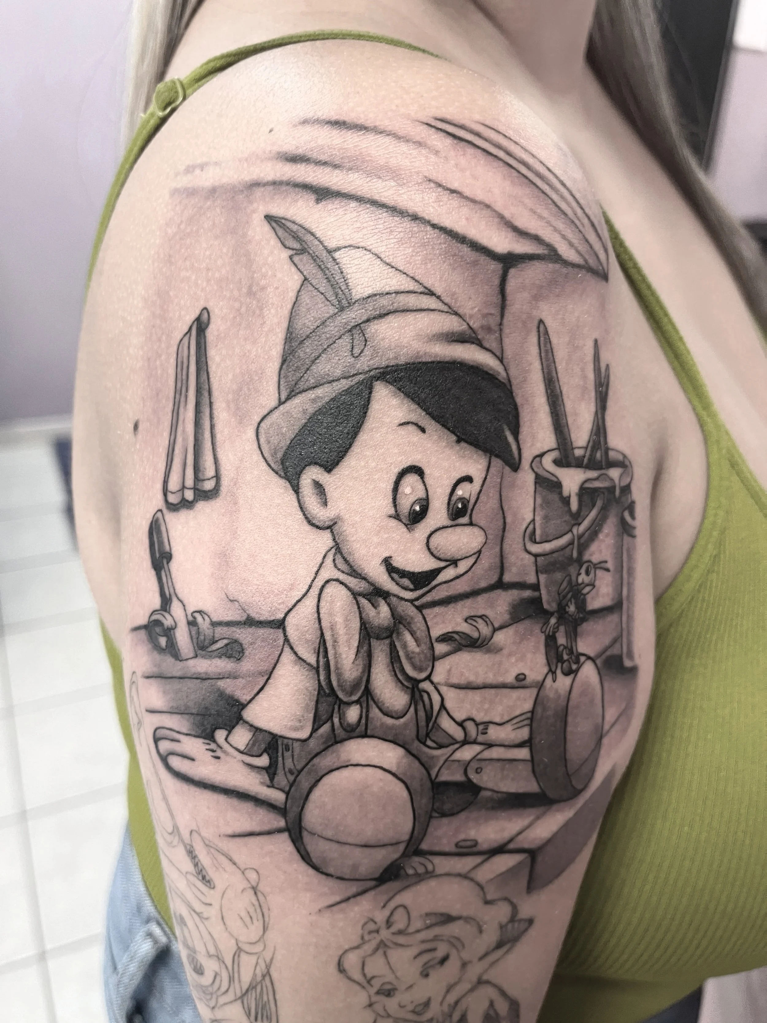 Pinocchio Disney black and grey tattoo