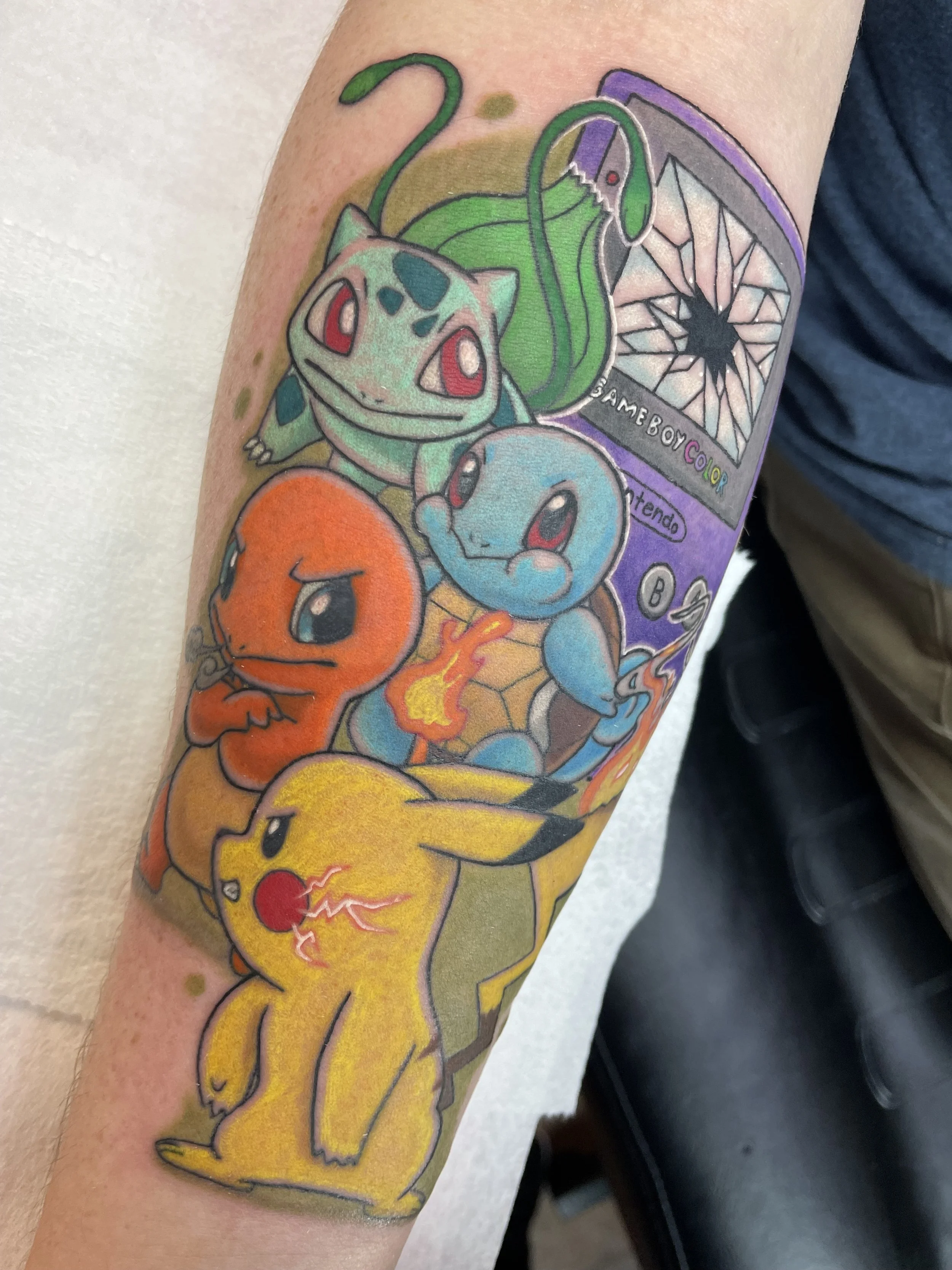 pokemon starter bulbasaur, squirtle, charmander, pikachu pokemon video game tattoo