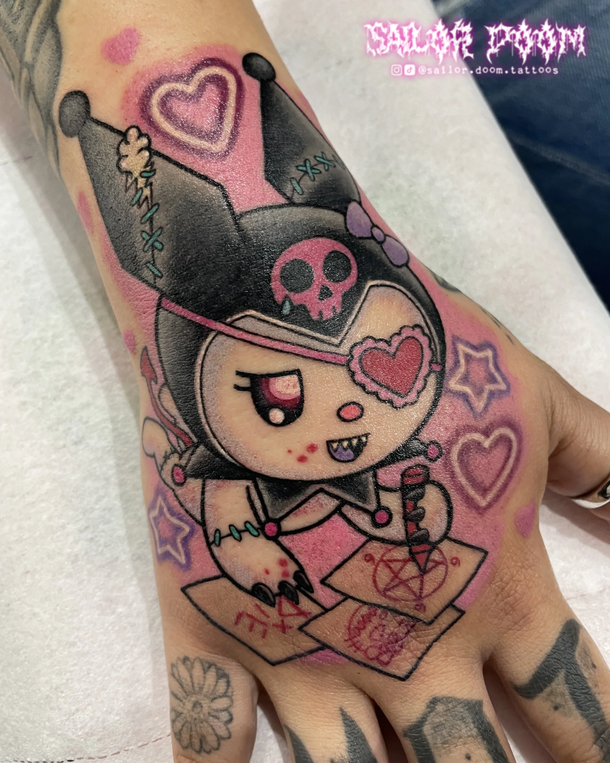 kuromi cute and creepy kawaii hand tattoo