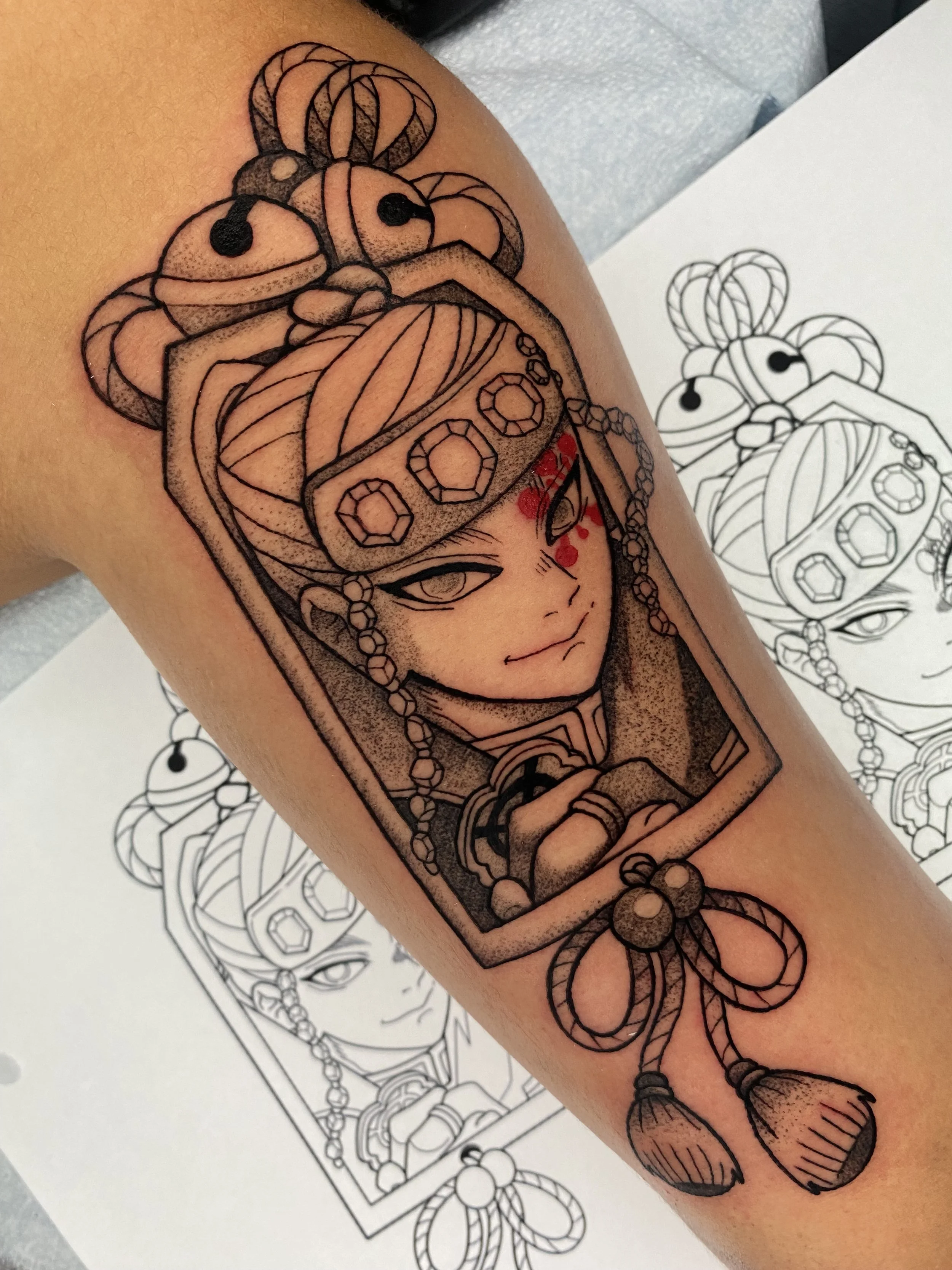 Tattoo of Tengen Uzui from demon slayer anime, black and grey tattoo