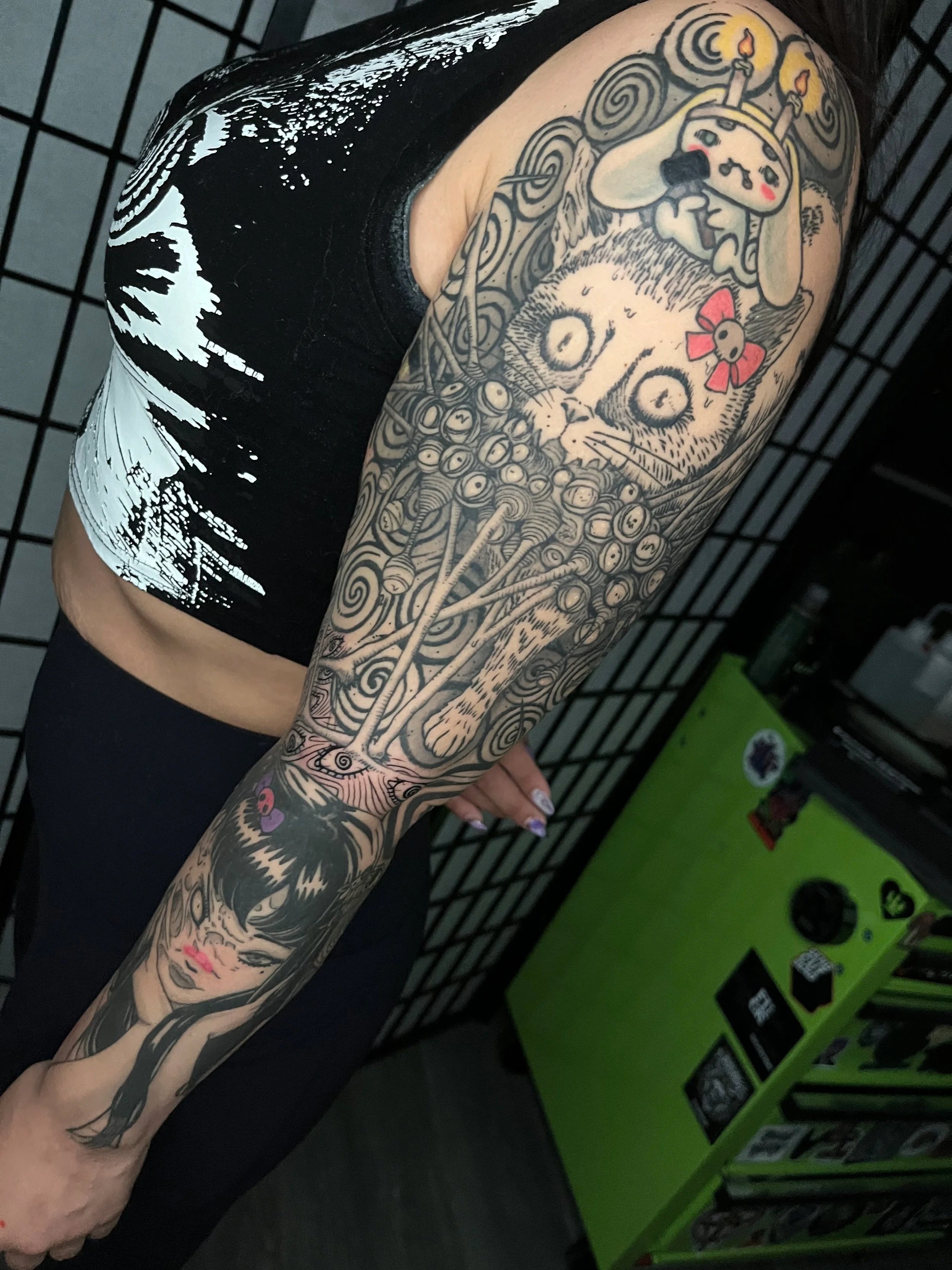 Junji Ito x Sanrio mashup tattoo sleeve