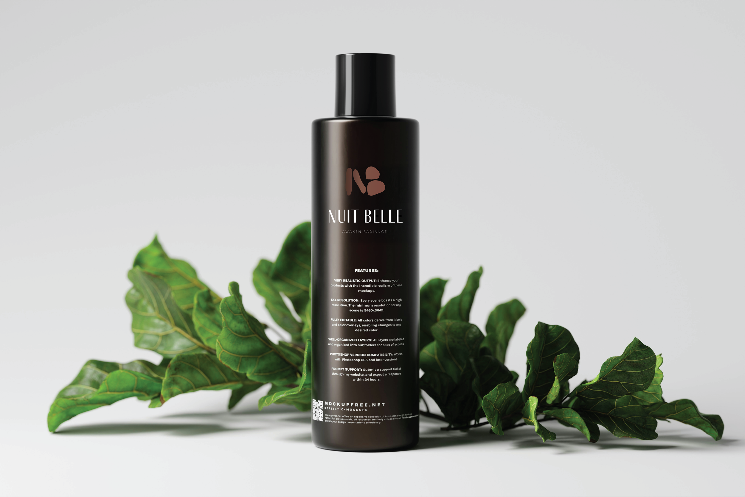Black skincare bottle labeled 'Nuit Belle' with green leaves in the background.