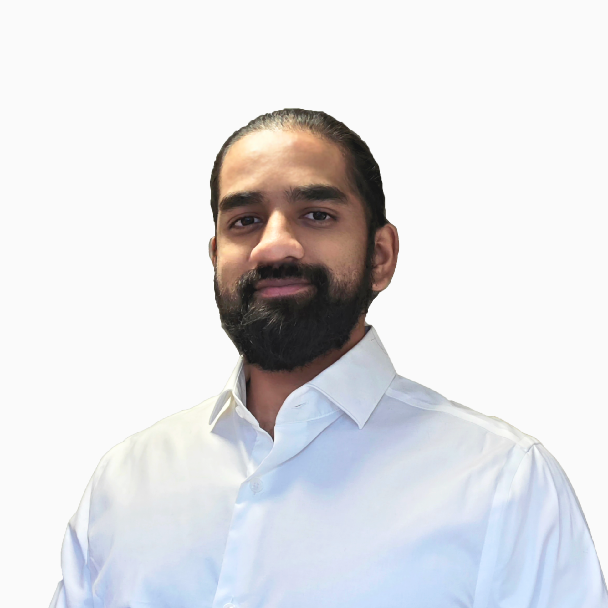 Portrait of a man with dark hair and beard wearing a white button-up shirt, looking at the camera against a plain white background.