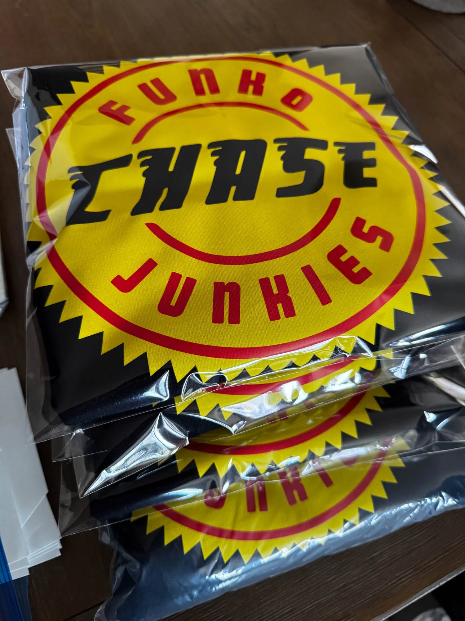 Stacked packages of Fungo Cheese with bright yellow and red logo on clear plastic.
