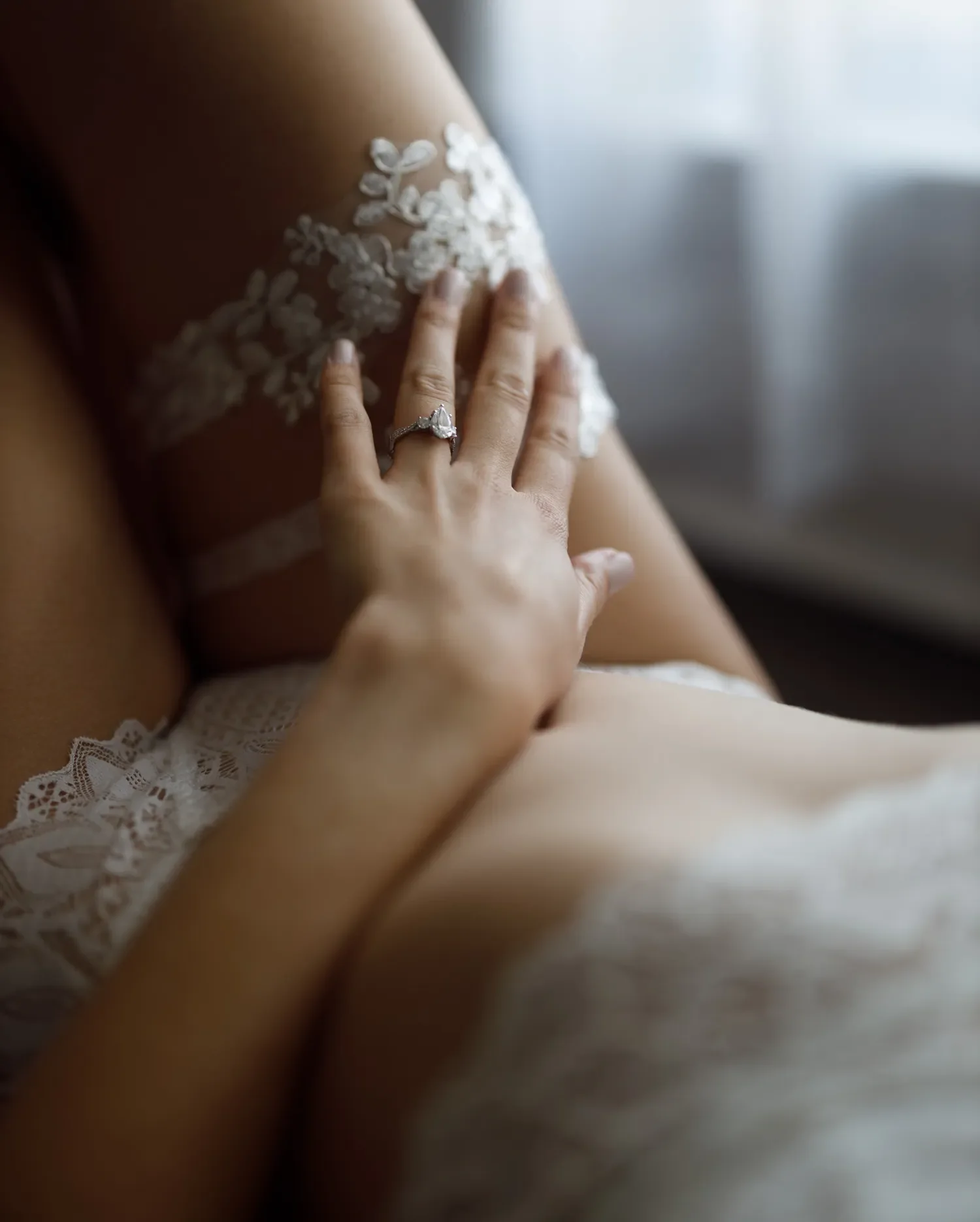 moody-dark-room-bridal-boudoir-engagement-ring-lingerie