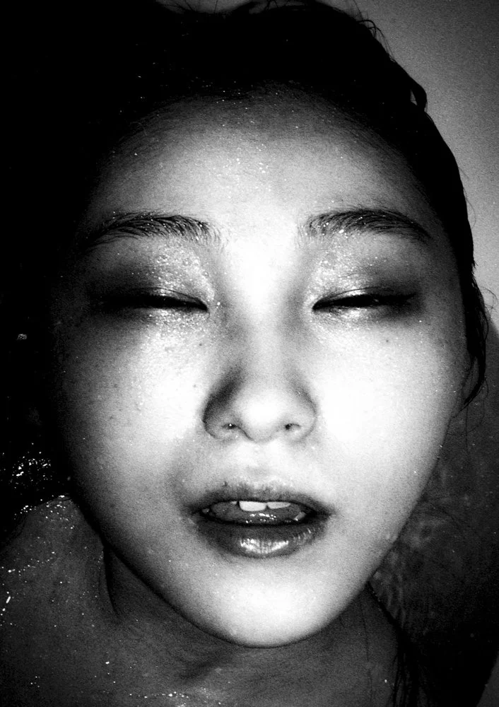 Black and white portrait of a Japanese lady.