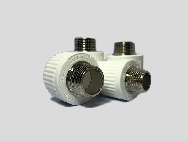 Two white plastic plumbing valves with metal threaded connectors against a plain background.
