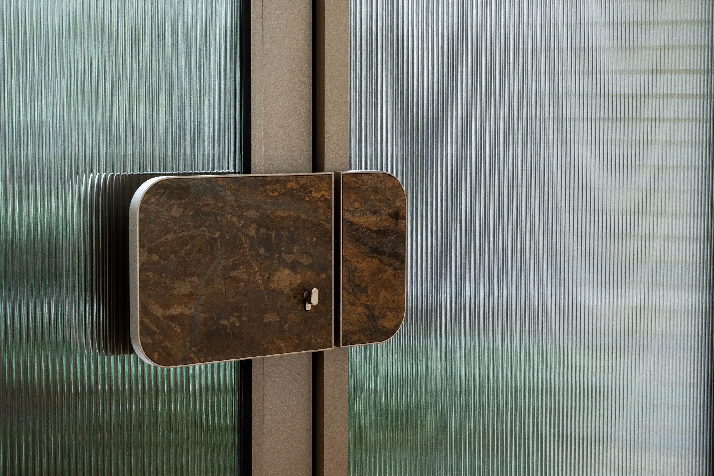 Fluted glass door with custom designed pull handle, Melbourne residence