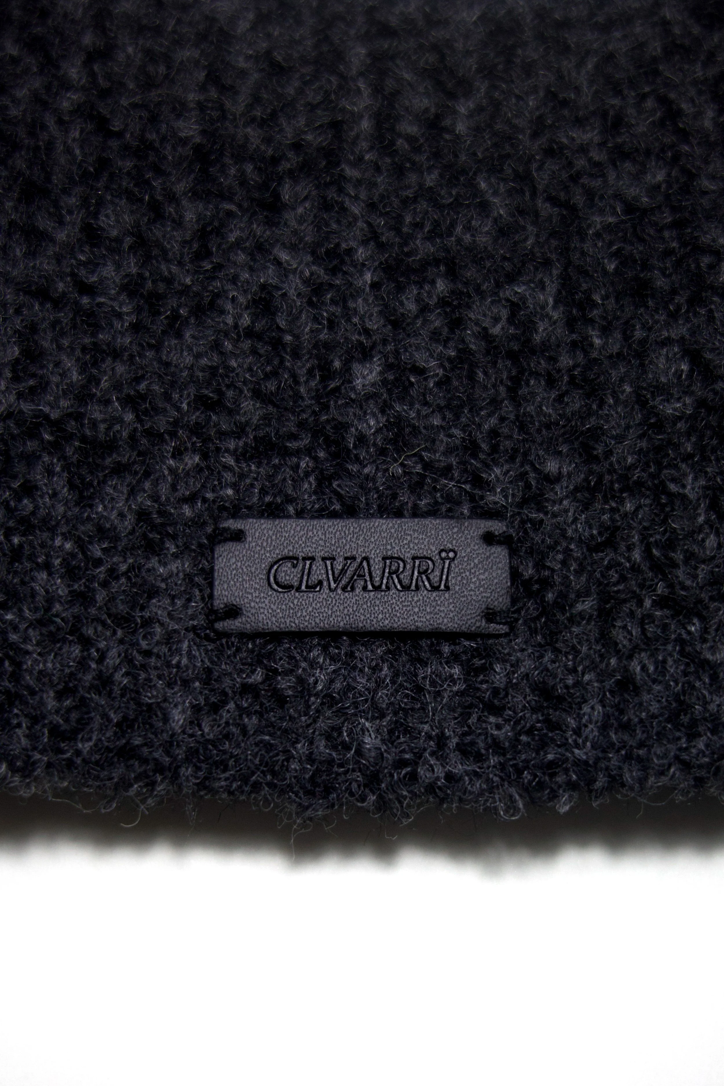 CLOSE UP LEATHER LABEL BLACK.JPG