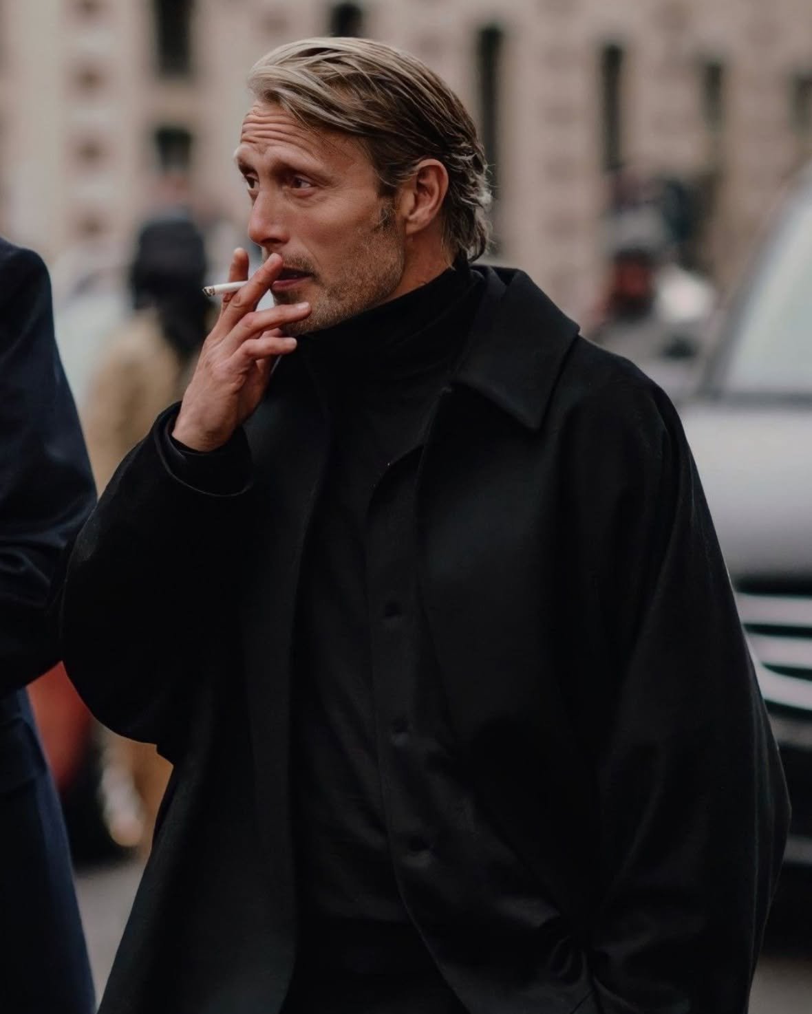 Mads Mikkelsen&rsquo;s wardrobe feels unmistakably Scandinavian. It relies on sharp tailoring, restrained colours and well-made basics rather than obvious statements, but it never feels overly polished.

Whether he&rsquo;s attending the Cannes Film F