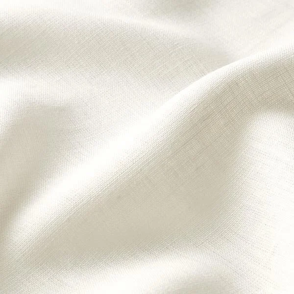 Close-up of white fabric with a smooth texture and gentle folds.