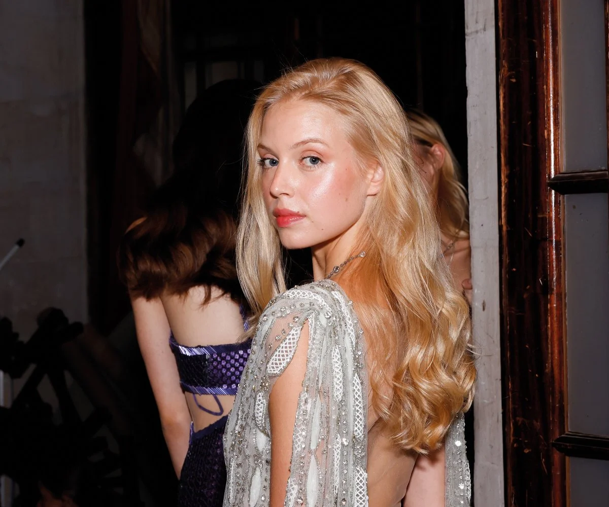 Behind-the-scenes fashion photography capturing backstage atmosphere during fashion week preparations