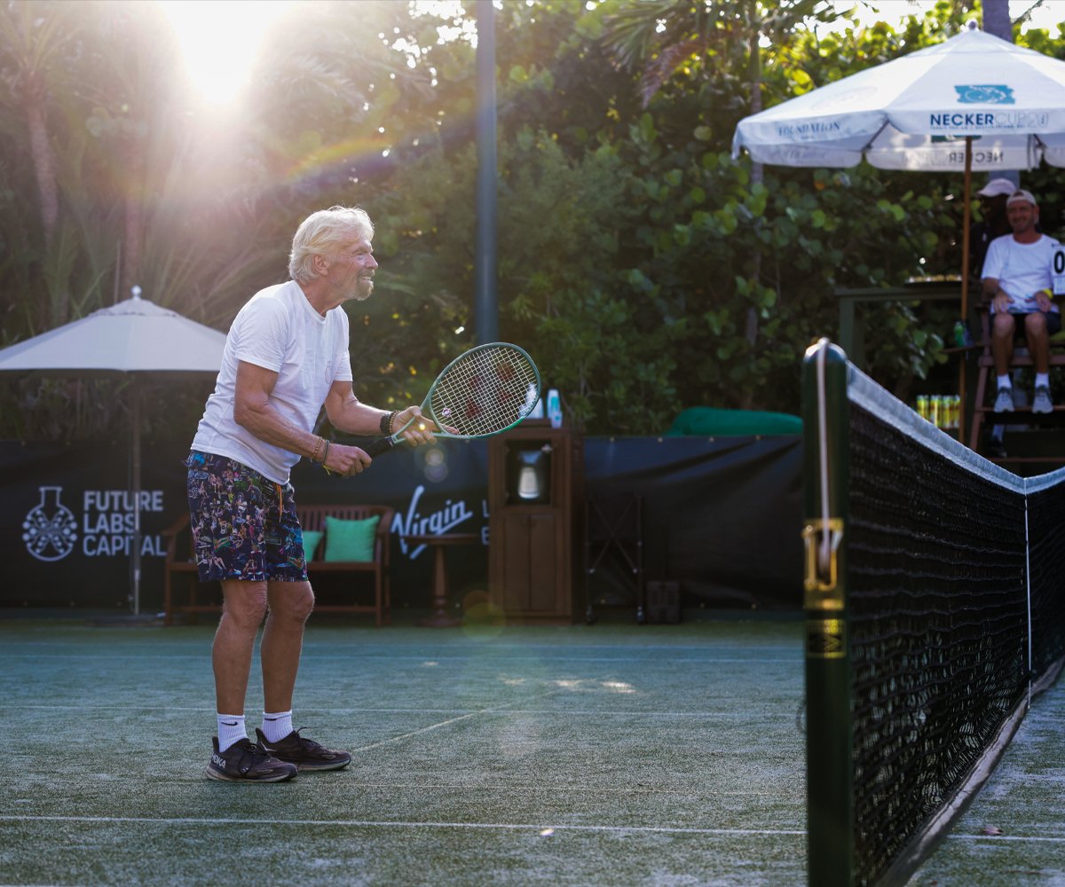 High-end event photography documenting a celebratory moment at a luxury brand event