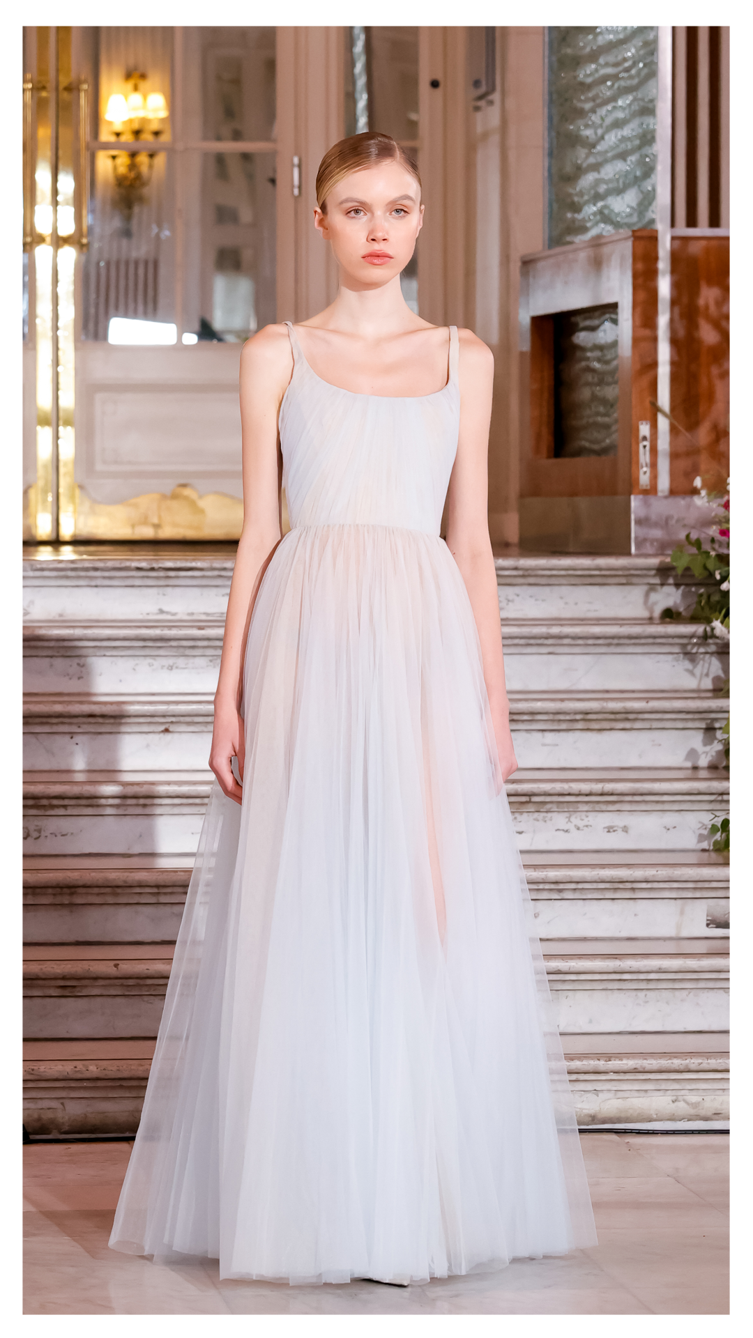 Catwalk fashion photography highlighting a designer look during a runway presentation