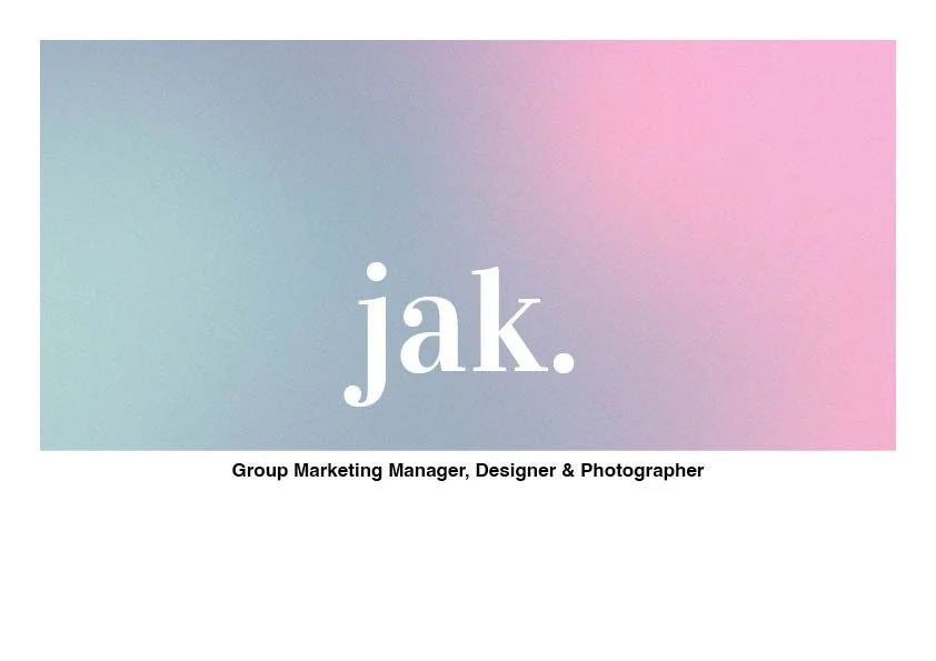 A business card or digital graphic with a pastel gradient background and the name 'jak.' in large, white lowercase letters. Below, it states 'Group Marketing Manager, Designer & Photographer' in smaller black text.