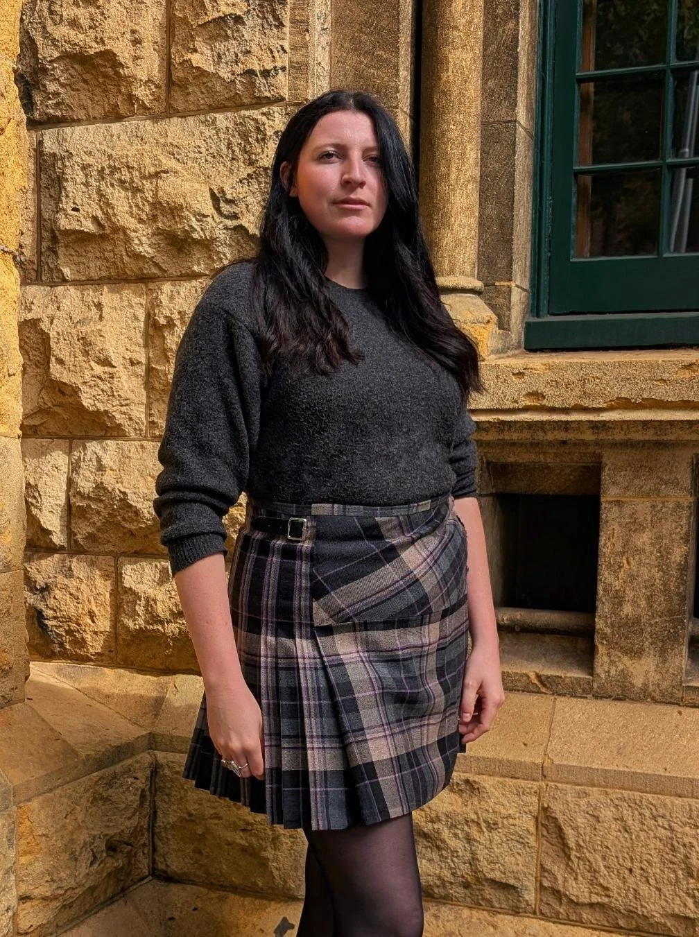 Kacey in her bespoke Clunie Charcoal Kilt