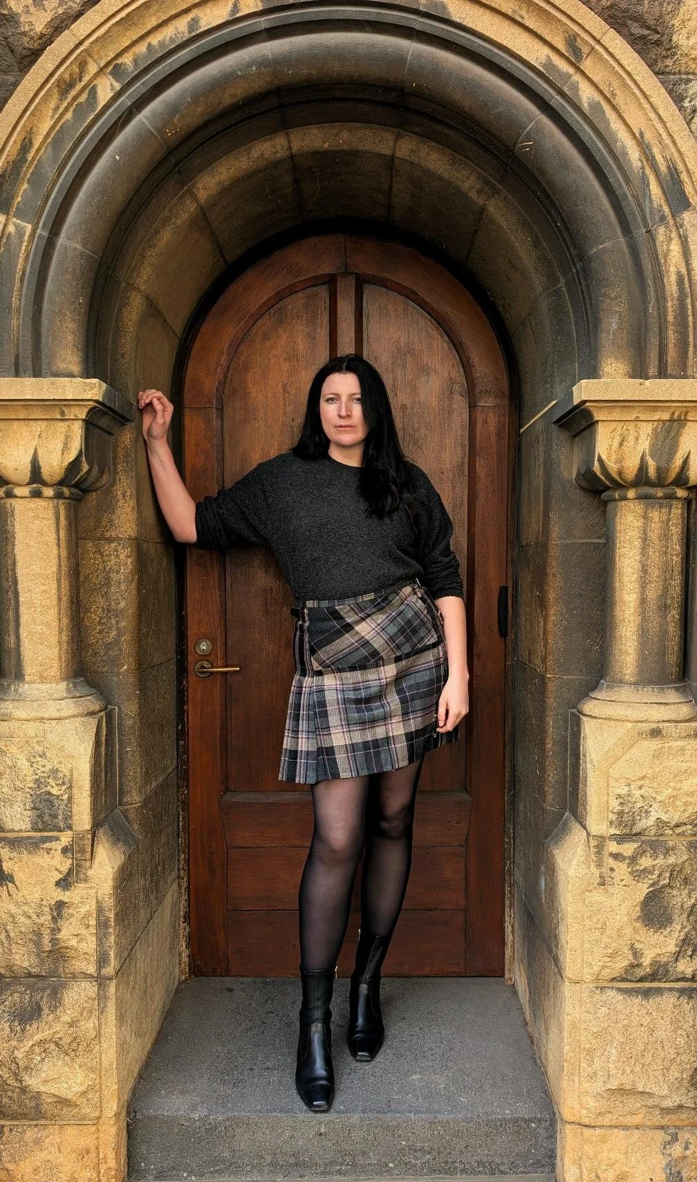 Kacey in her bespoke Clunie Charcoal Kilt