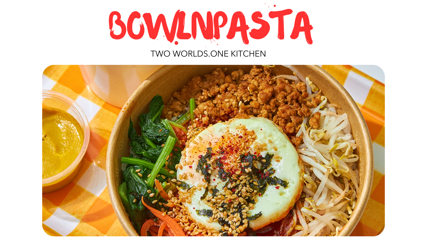 A poke bowl with ground meat, vegetables, and a fried egg, topped with sesame seeds and seaweed, on a checkered tablecloth.