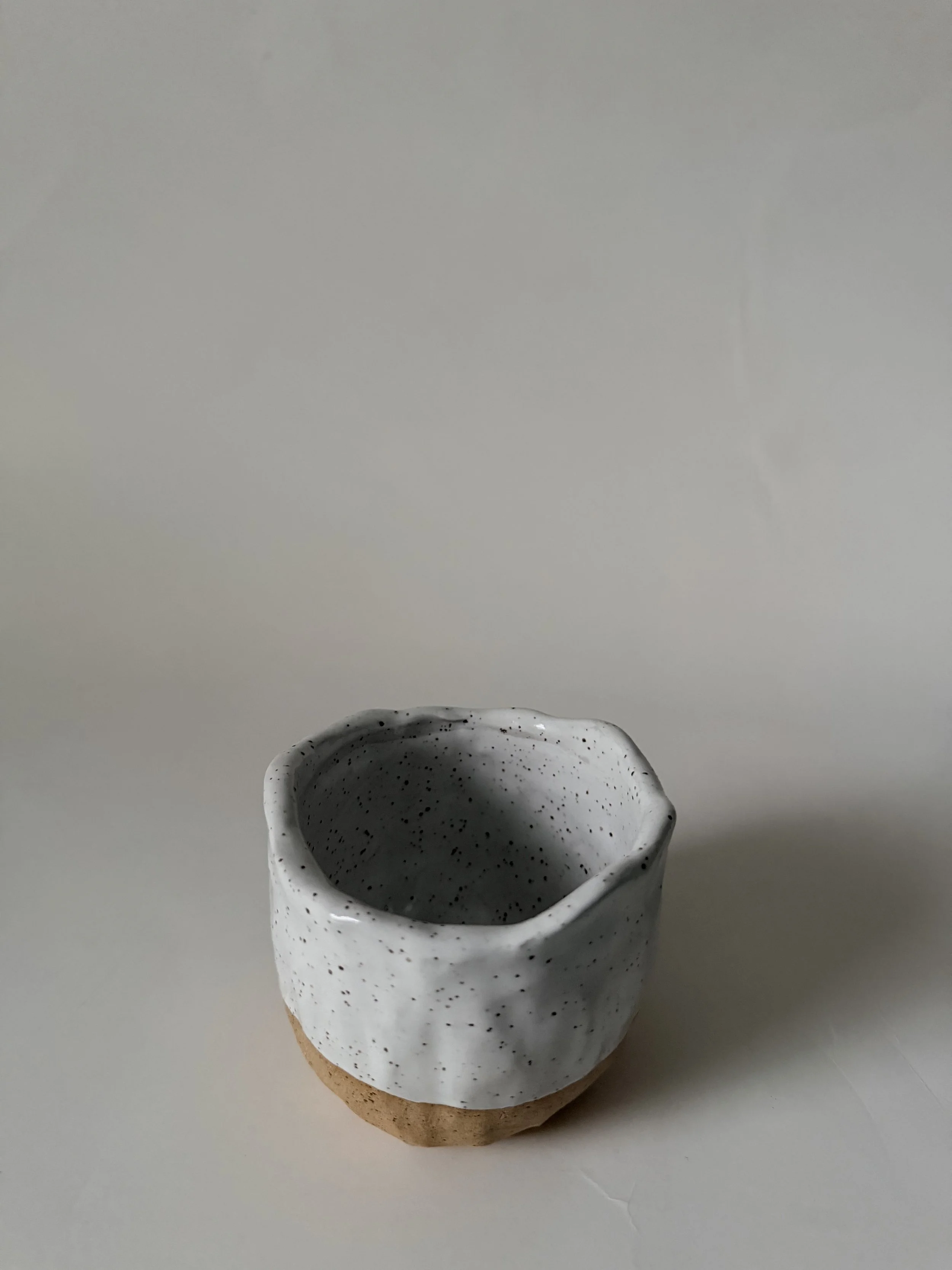 White handbuilt cup