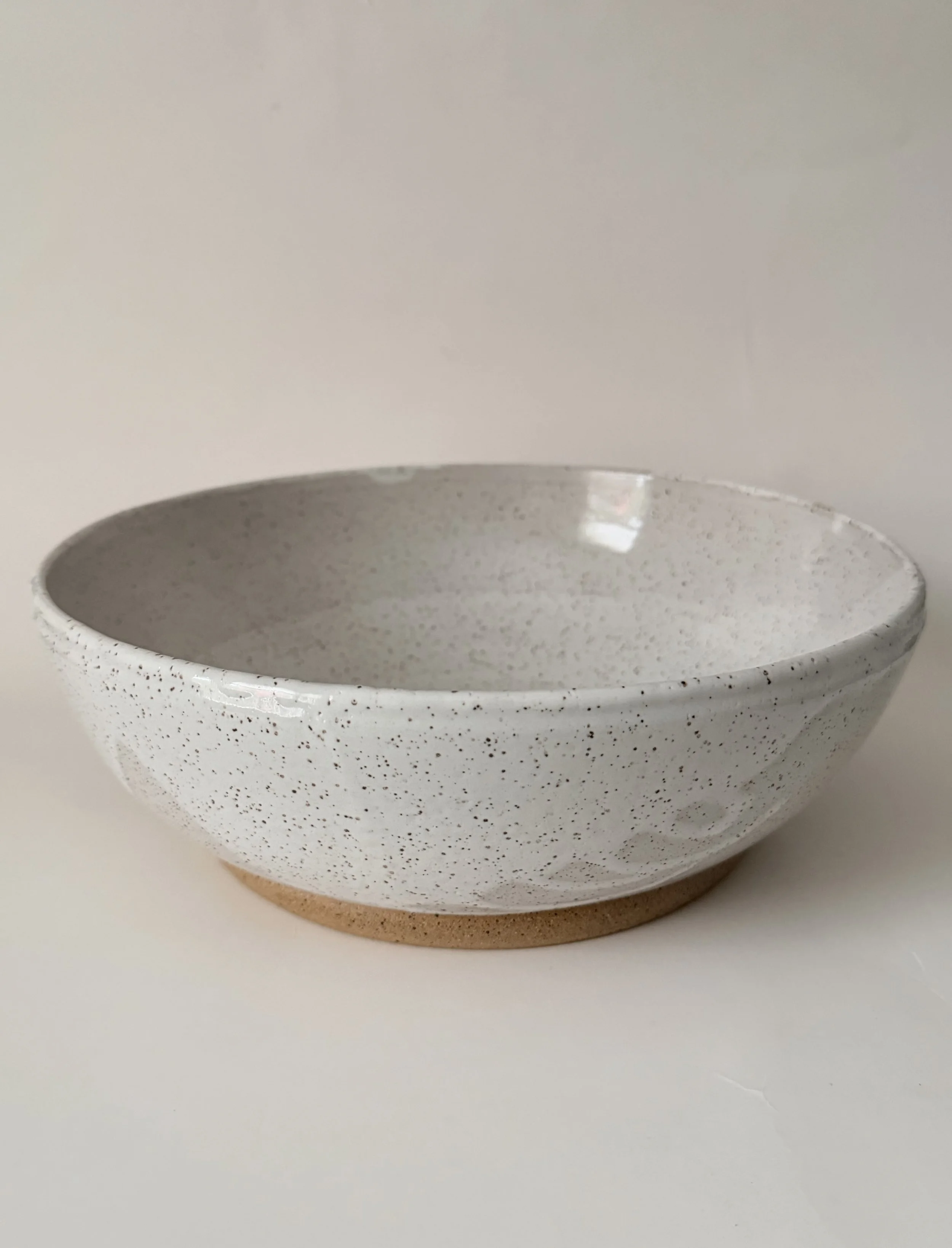 Large white speckled bowl