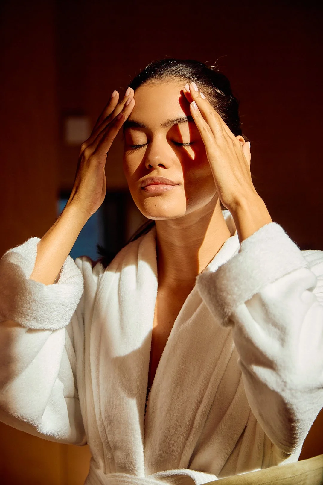 Woman rediscovering connection and realigning her true self through healing.