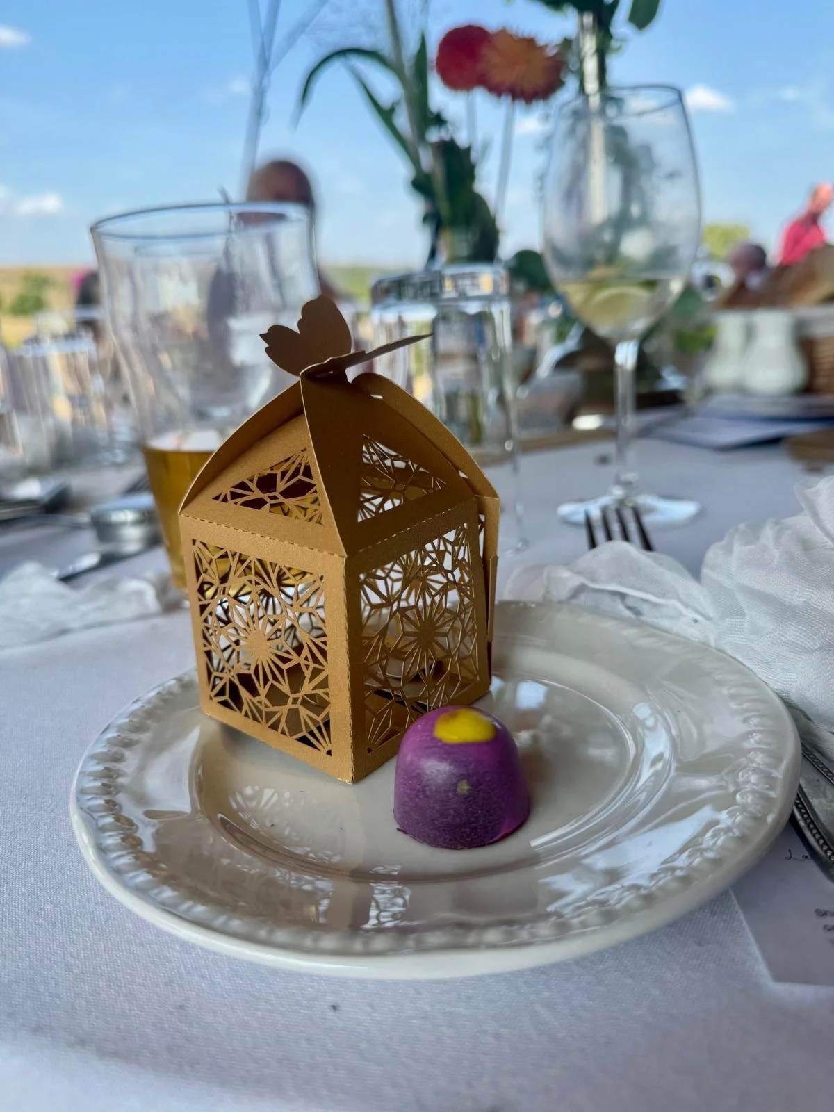 Hand-painted OzMo chocolate bonbons created by Laura for her own wedding.
