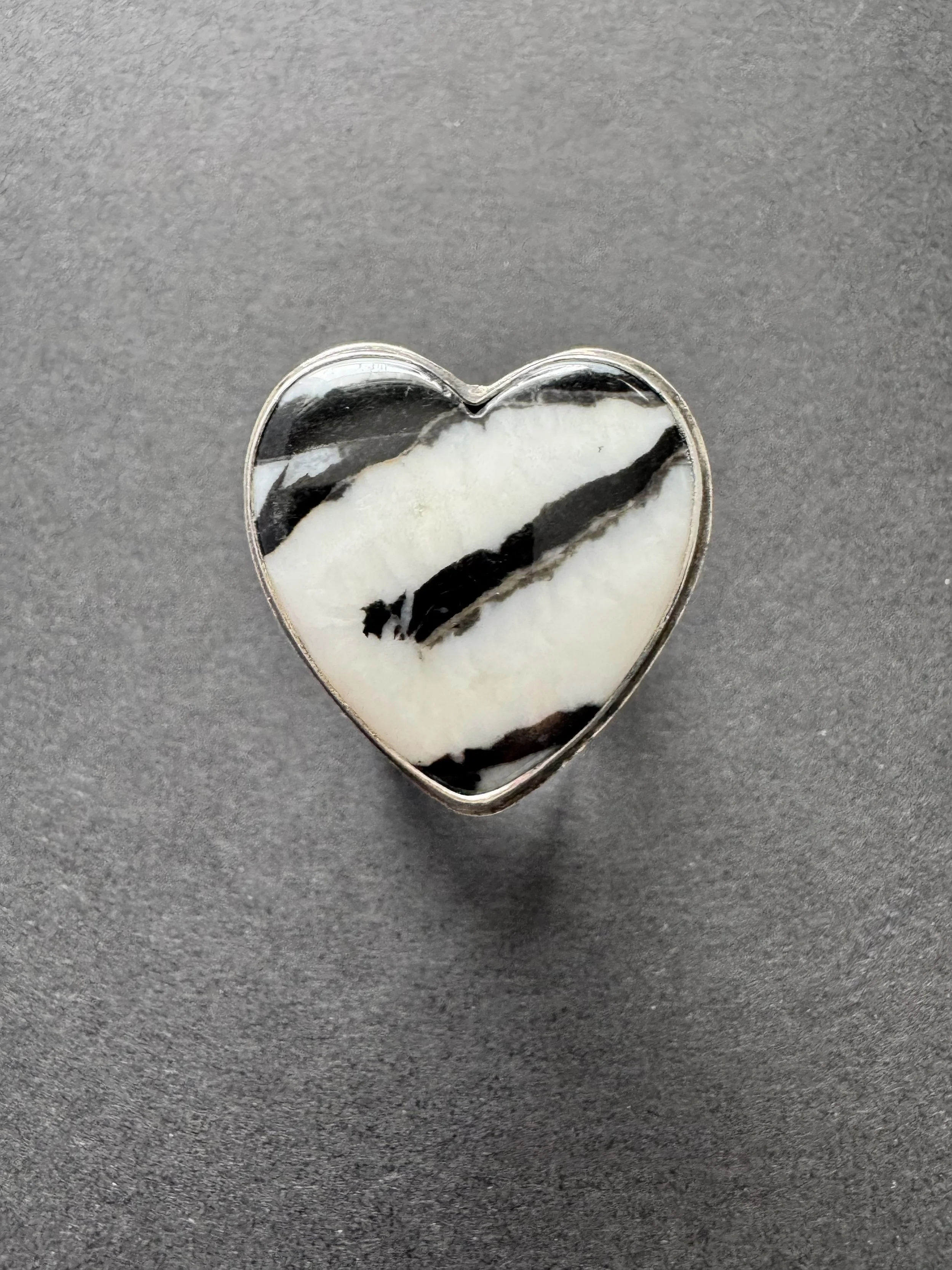White buffalo heart set in sterling silver