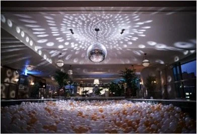 Soho House rooftop swimming pool transformed into adult ball pit for experiential NYE activation