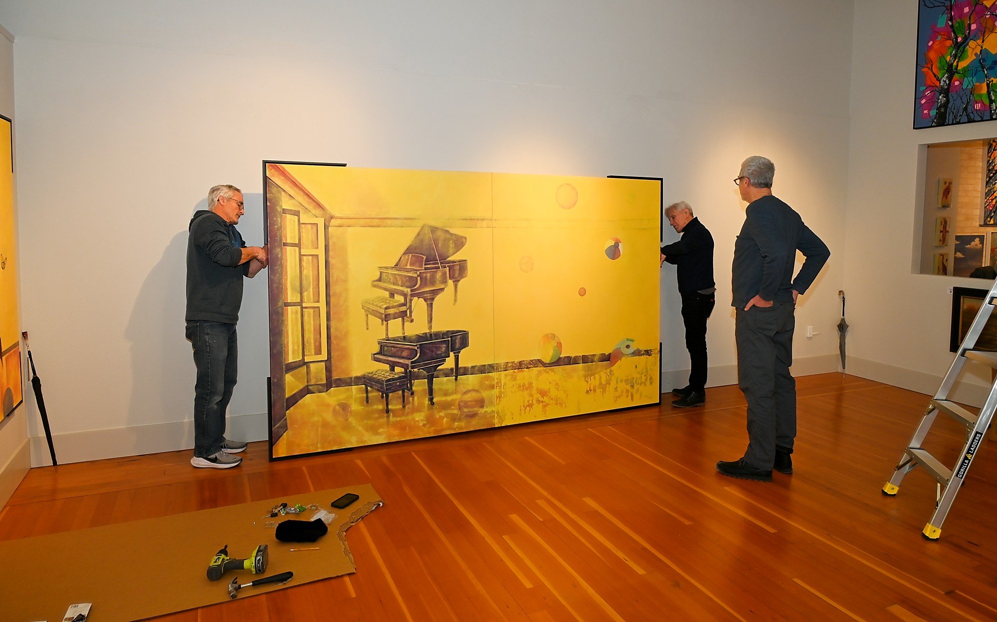 Hanging Eric Satie's Apartment with artist Gary Westford.