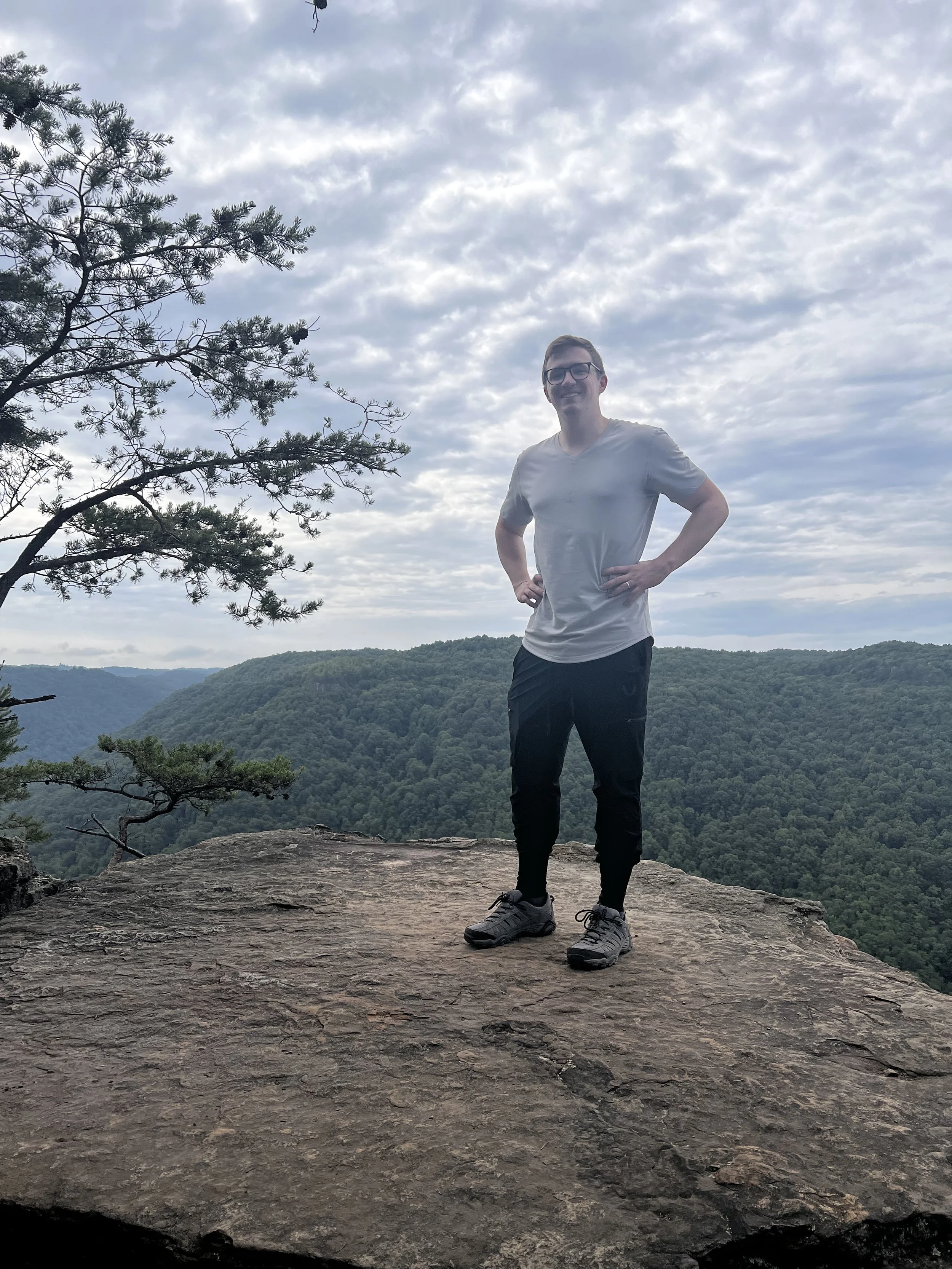 Thomas J. Fewer hiking outdoors during international research travel.