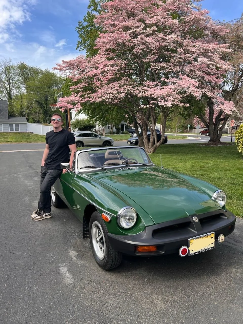 Thomas J. Fewer working on a vintage automobile hobby.