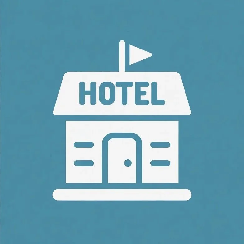 Icon of a hotel building with a flag on top and the word 'HOTEL' on the front.
