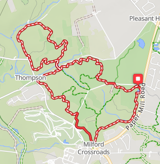Map showing a red trail looped through green parks near Milford Crossroads, Thompson, and Pleasant Hill areas with roads and small bodies of water nearby.