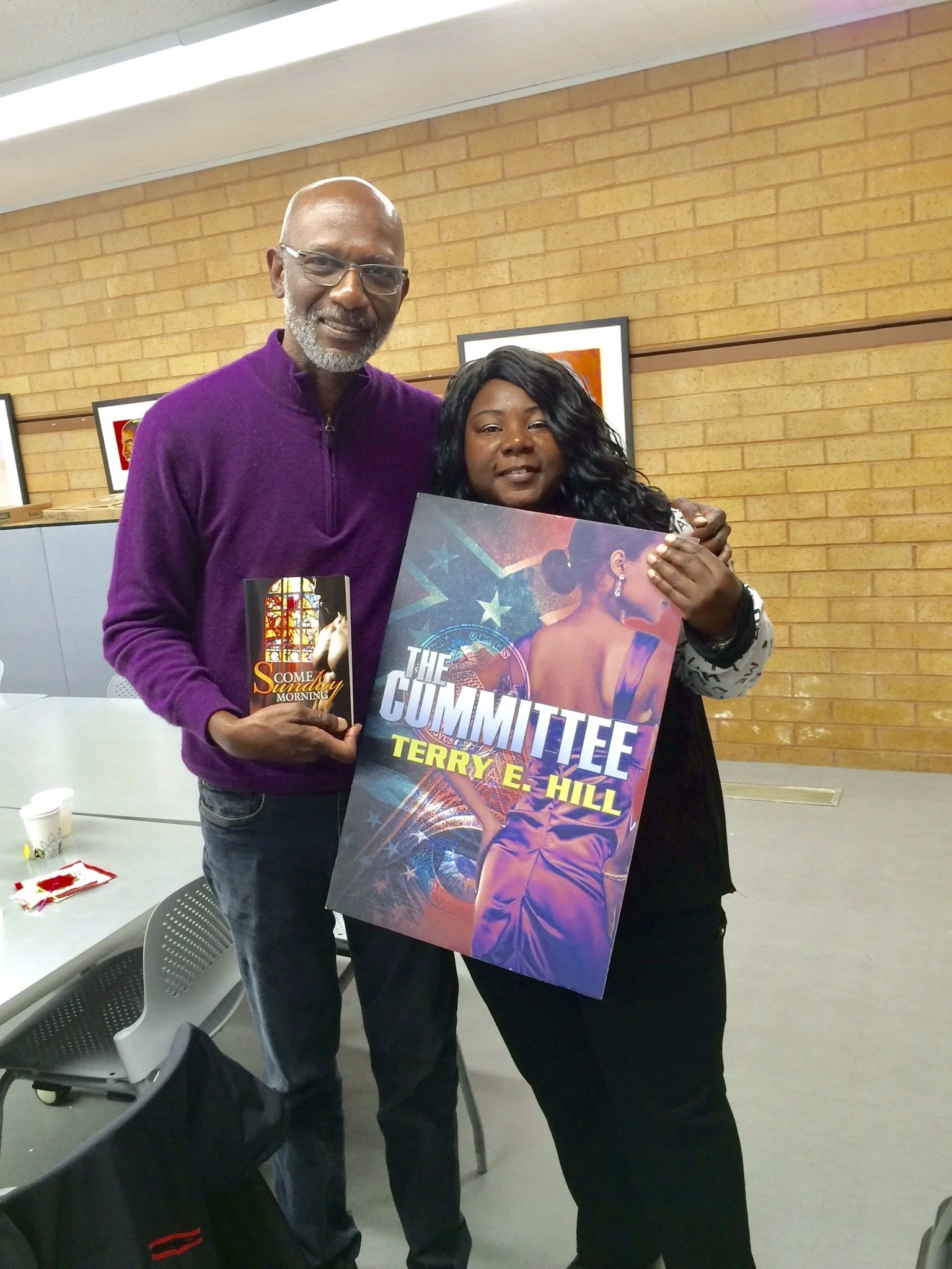 Terry with fan holding a poster