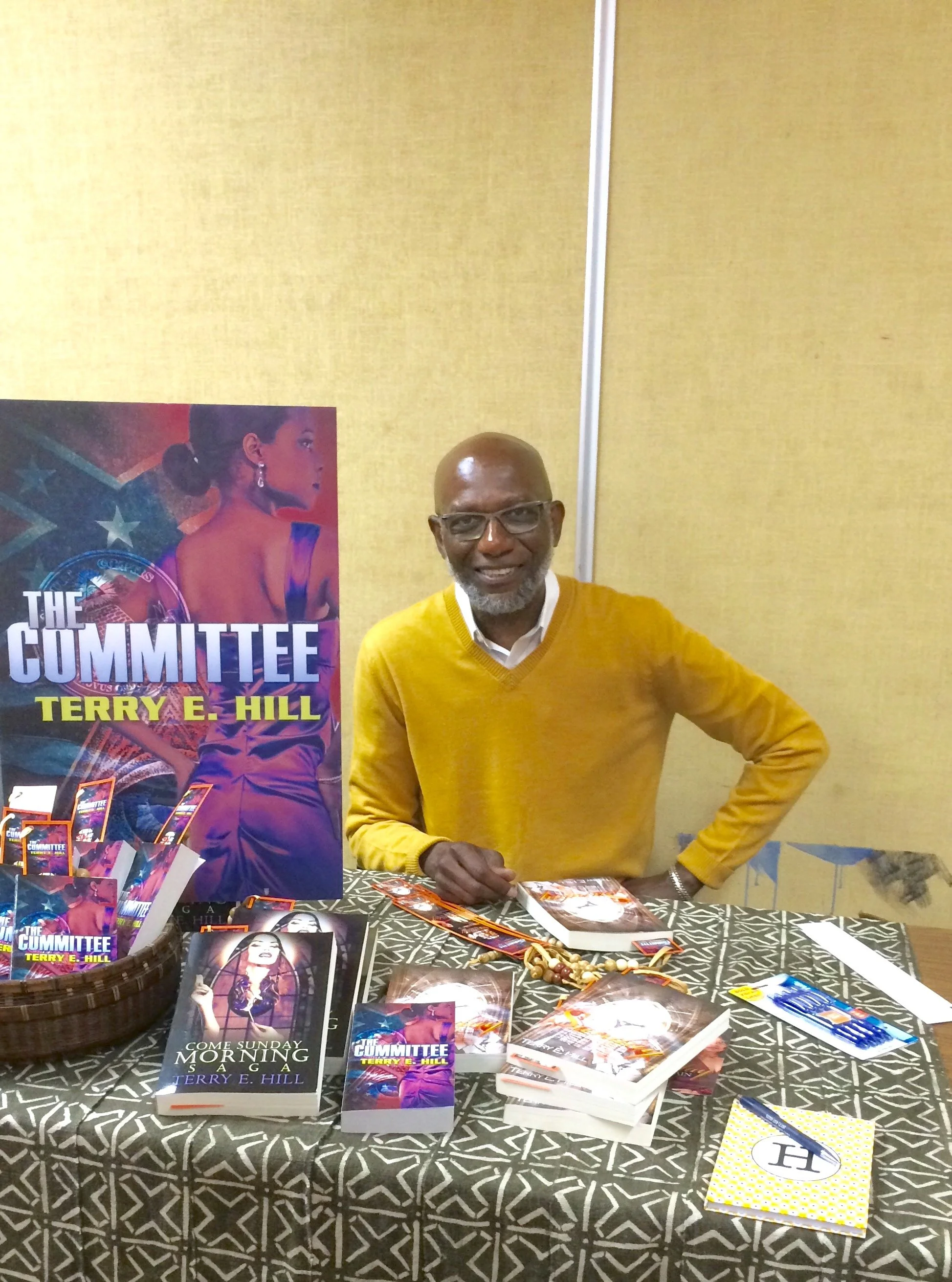 Terry Hill posing at the signing table