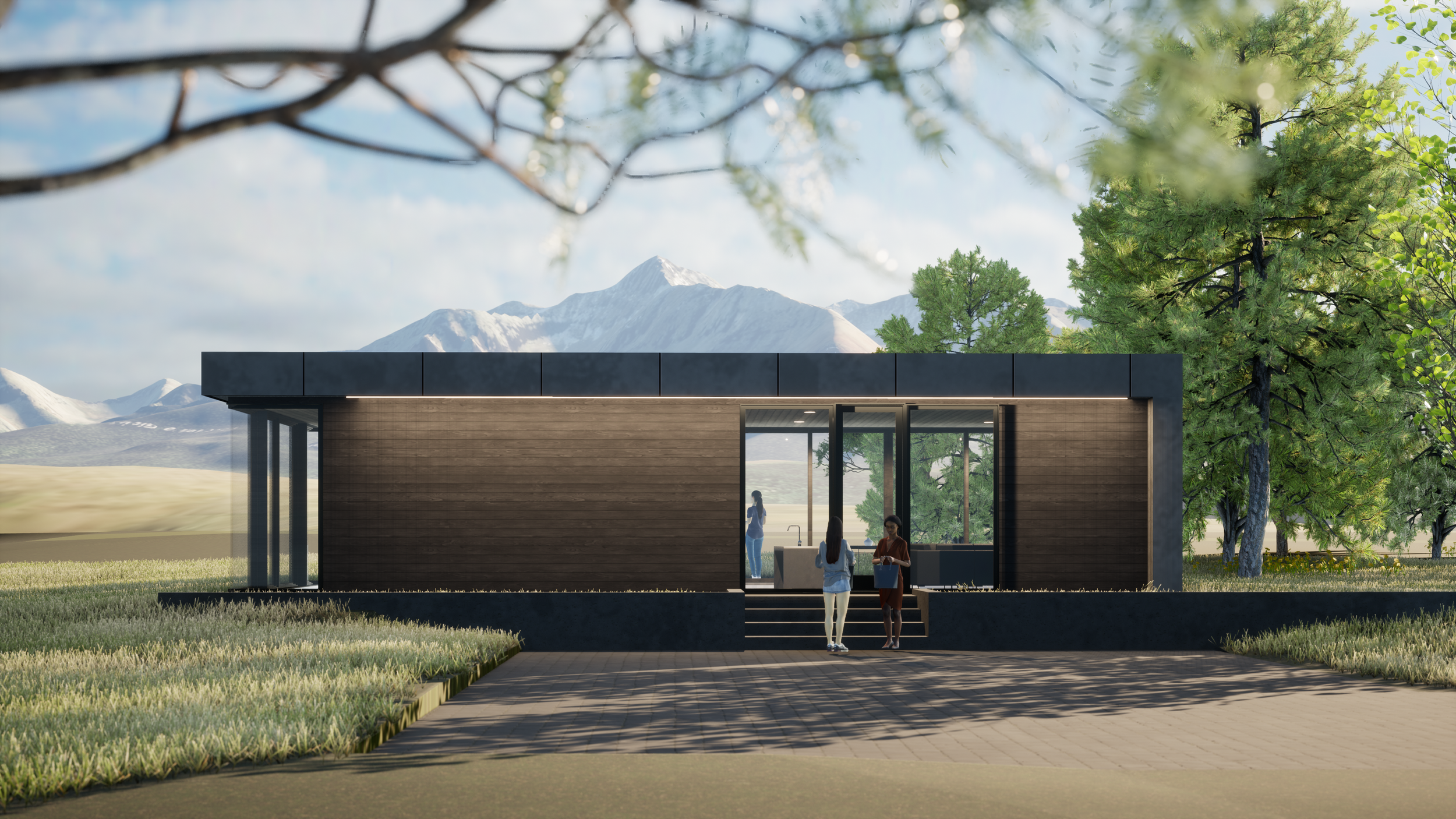 Modern building with large glass windows and a flat roof, set against a mountainous landscape with snow-capped peaks, surrounded by green trees and grass, with three people standing outside on steps.