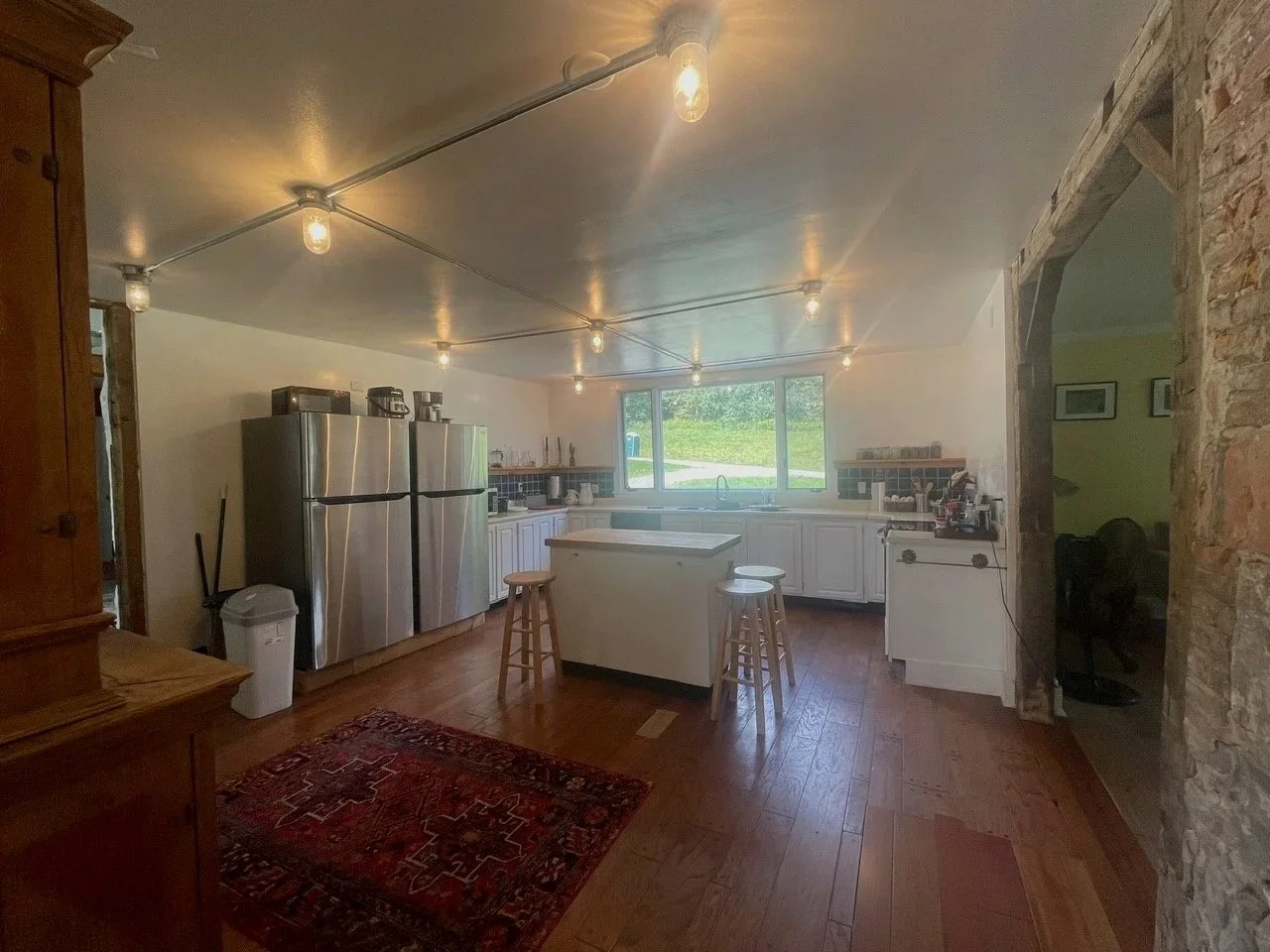 Levity Mountain Farmhouse kitchen includes two refrigerators and two dishwashers and plenty of storage. 