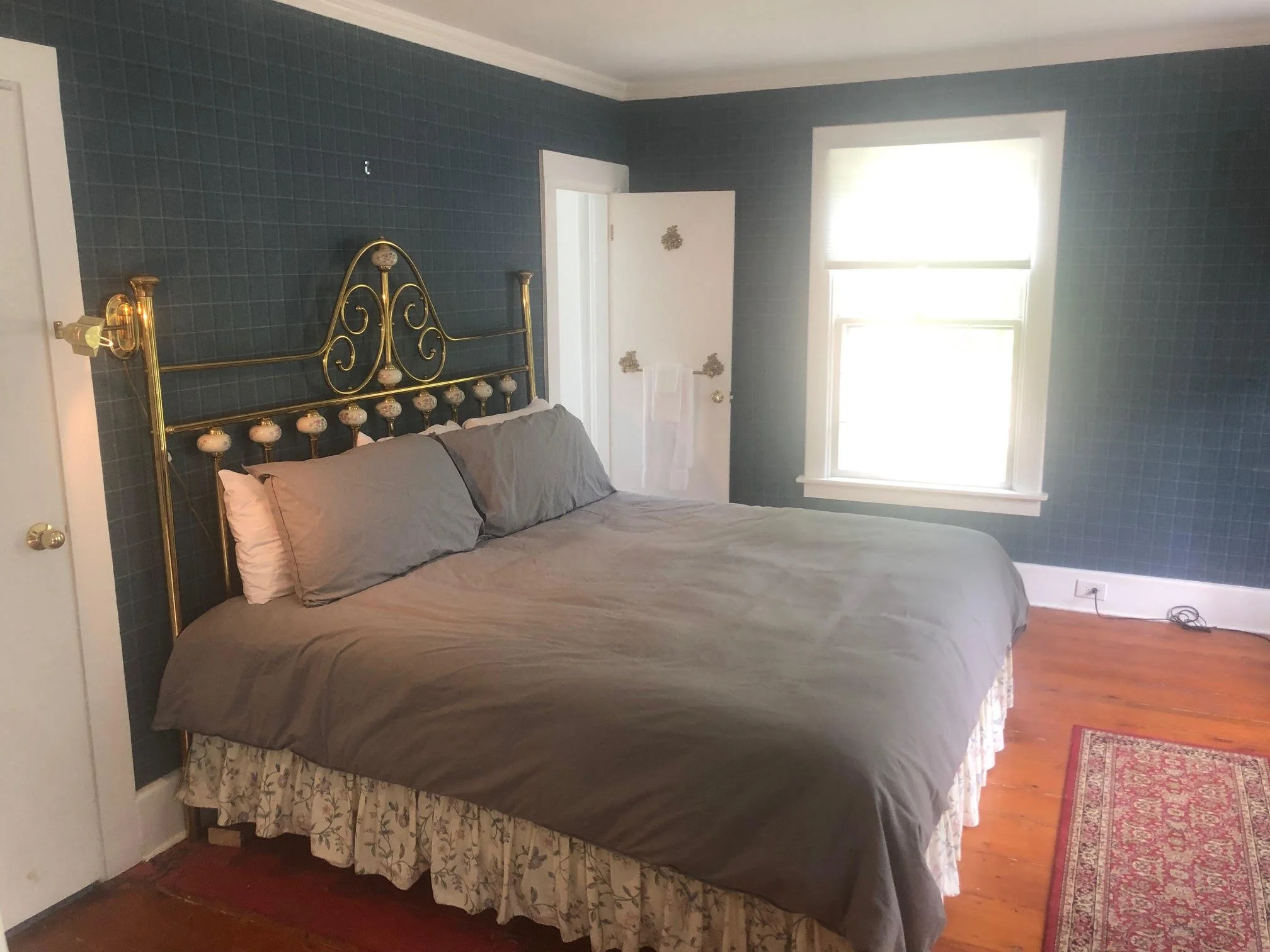 Rooms 3 and 4 are part of a suite that shares one full-bathroom. Suite includes a king-bedroom and a separate room with a full-bed. Featuring views of the property and the stream, this room is perfect for families or for two couples. 
