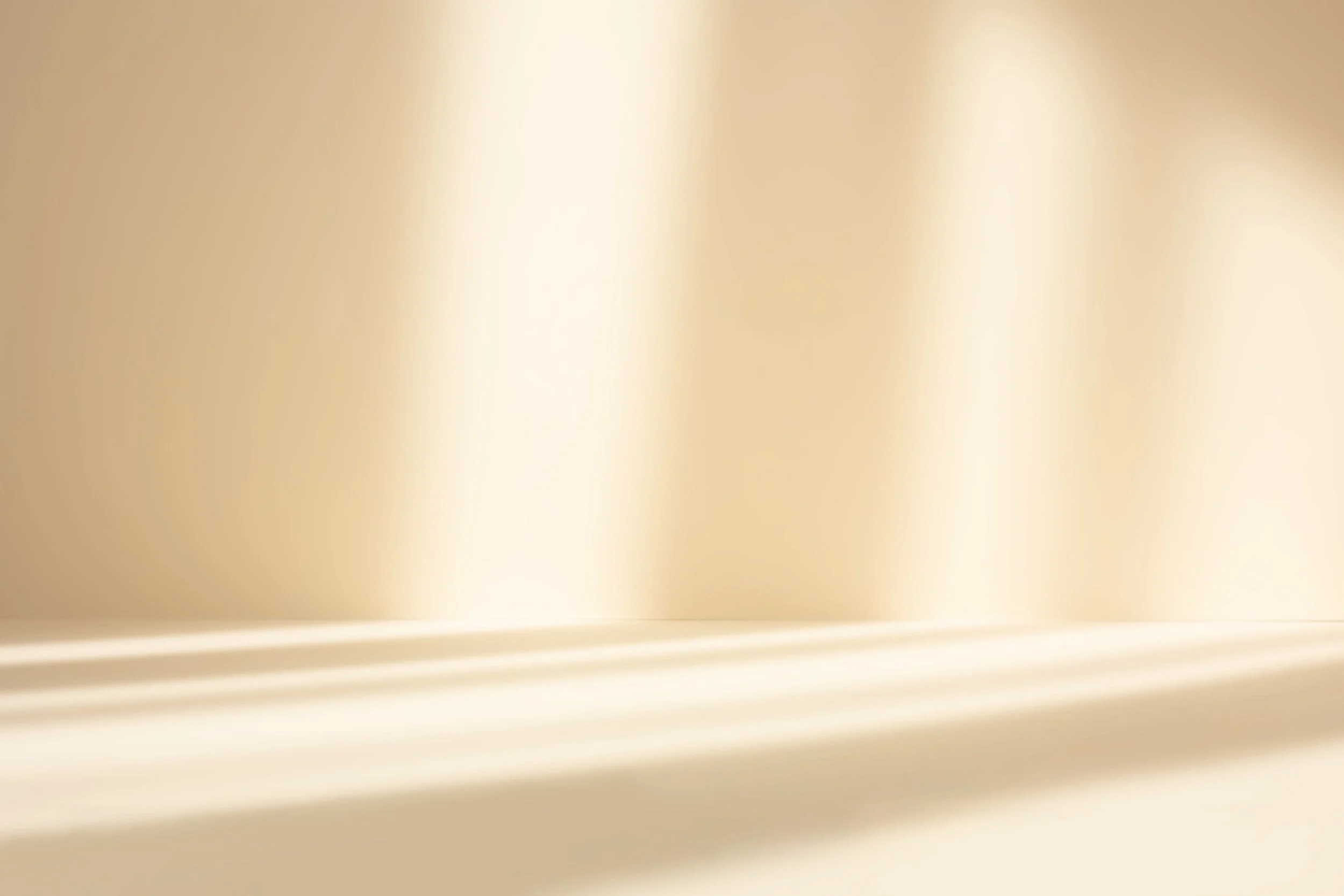 Close-up of a cream-colored wall with decorative molding.