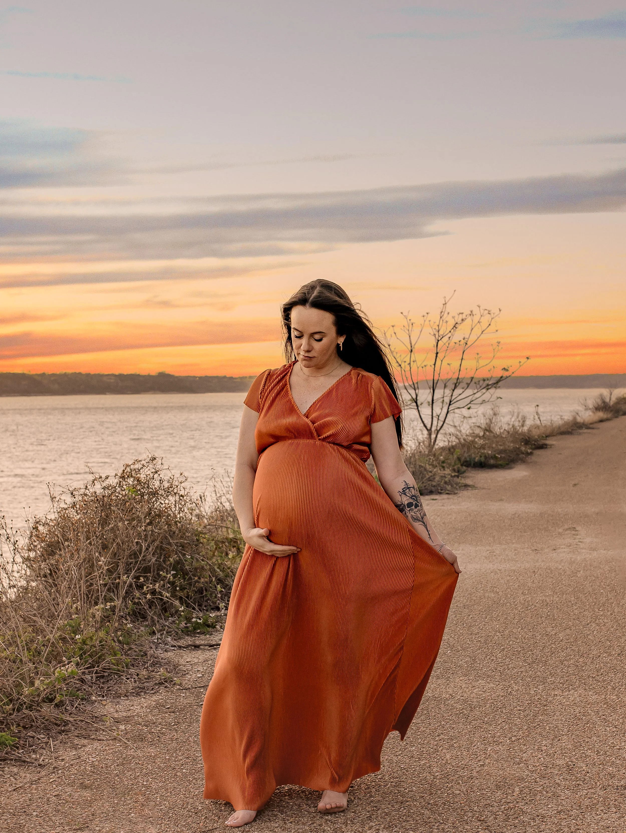 “Expecting mother photographed outdoors in Austin maternity session”