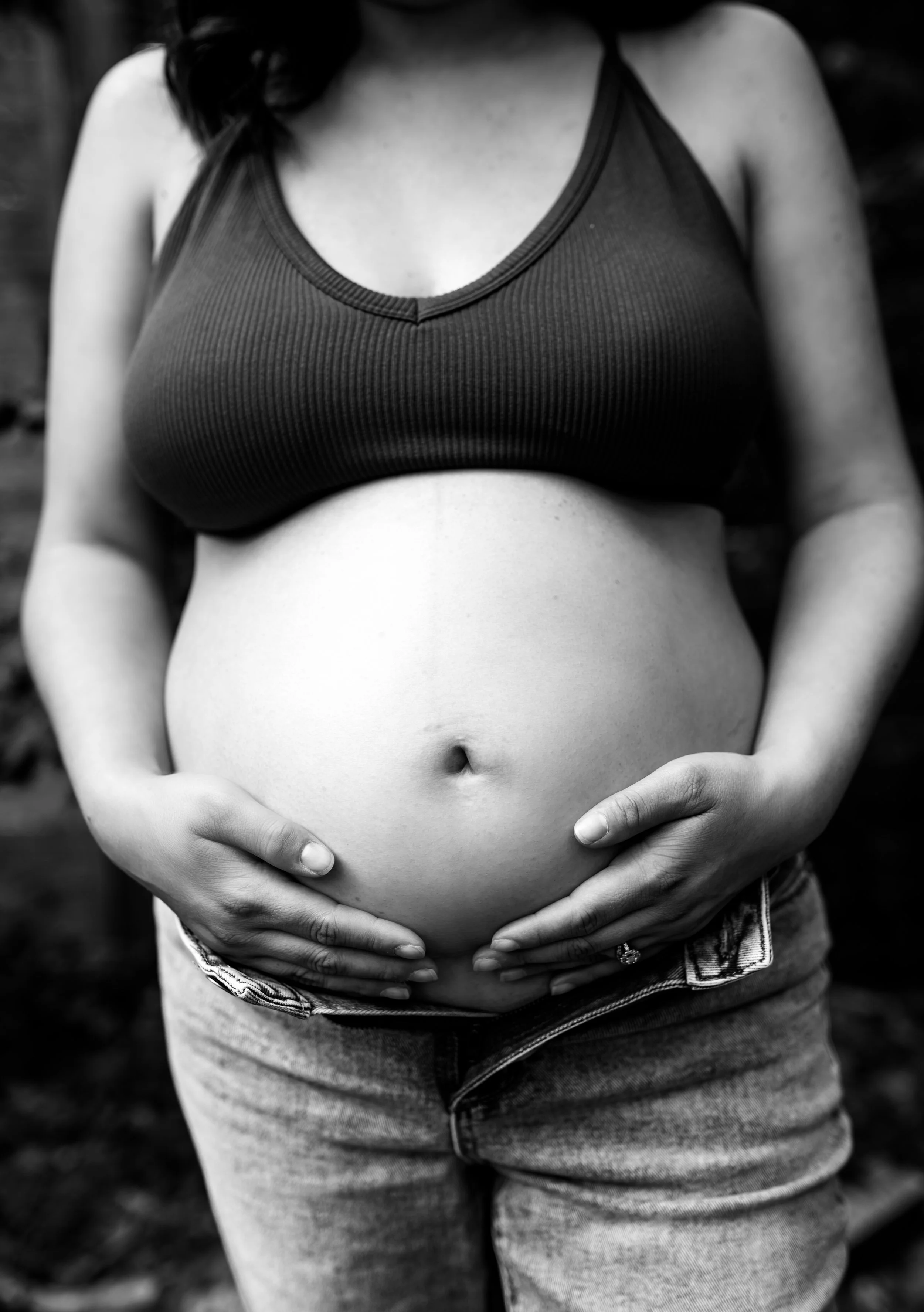Black and white studio maternity portrait of expecting mother in Round Rock, Texas