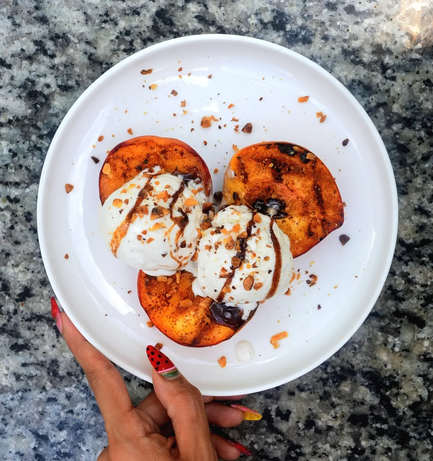 Grilled Peaches w. Vanilla Bean Ice Cream topped w. a Brandy Brown Sugar Syrup