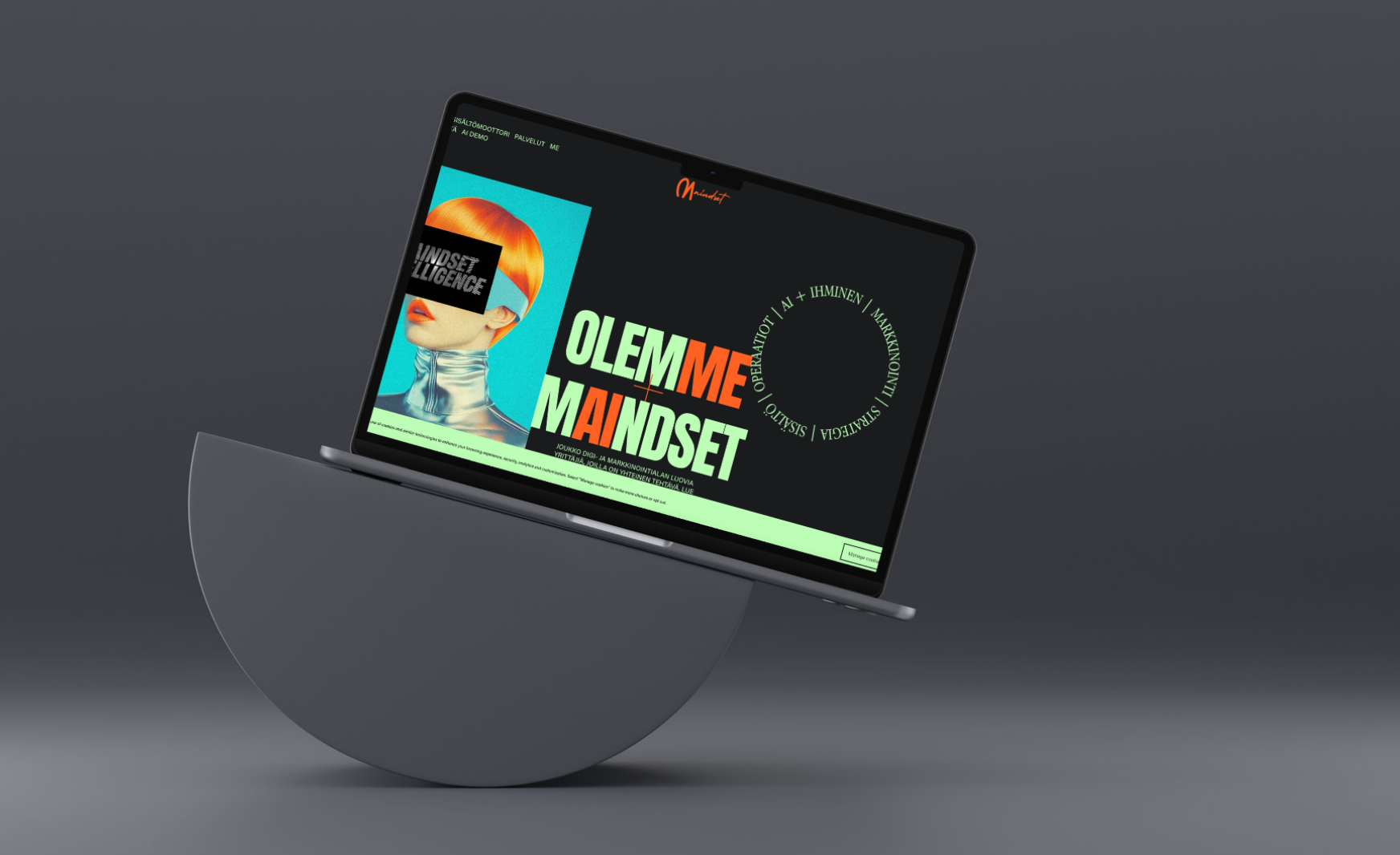 A laptop displaying a website with a graphic of a woman with red hair and futuristic styling. The website features bold text that says "OLEMME MAINDSET" and references AI, automation, operation, and marketing.