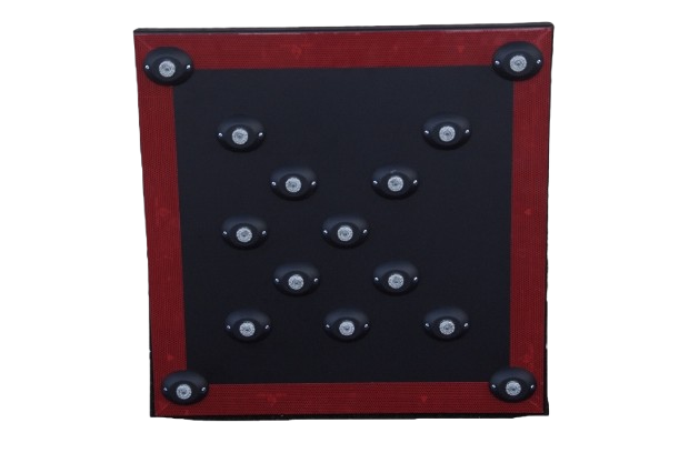 A black square with rounded corners and a red border, containing 15 small circular holes arranged in a grid pattern.