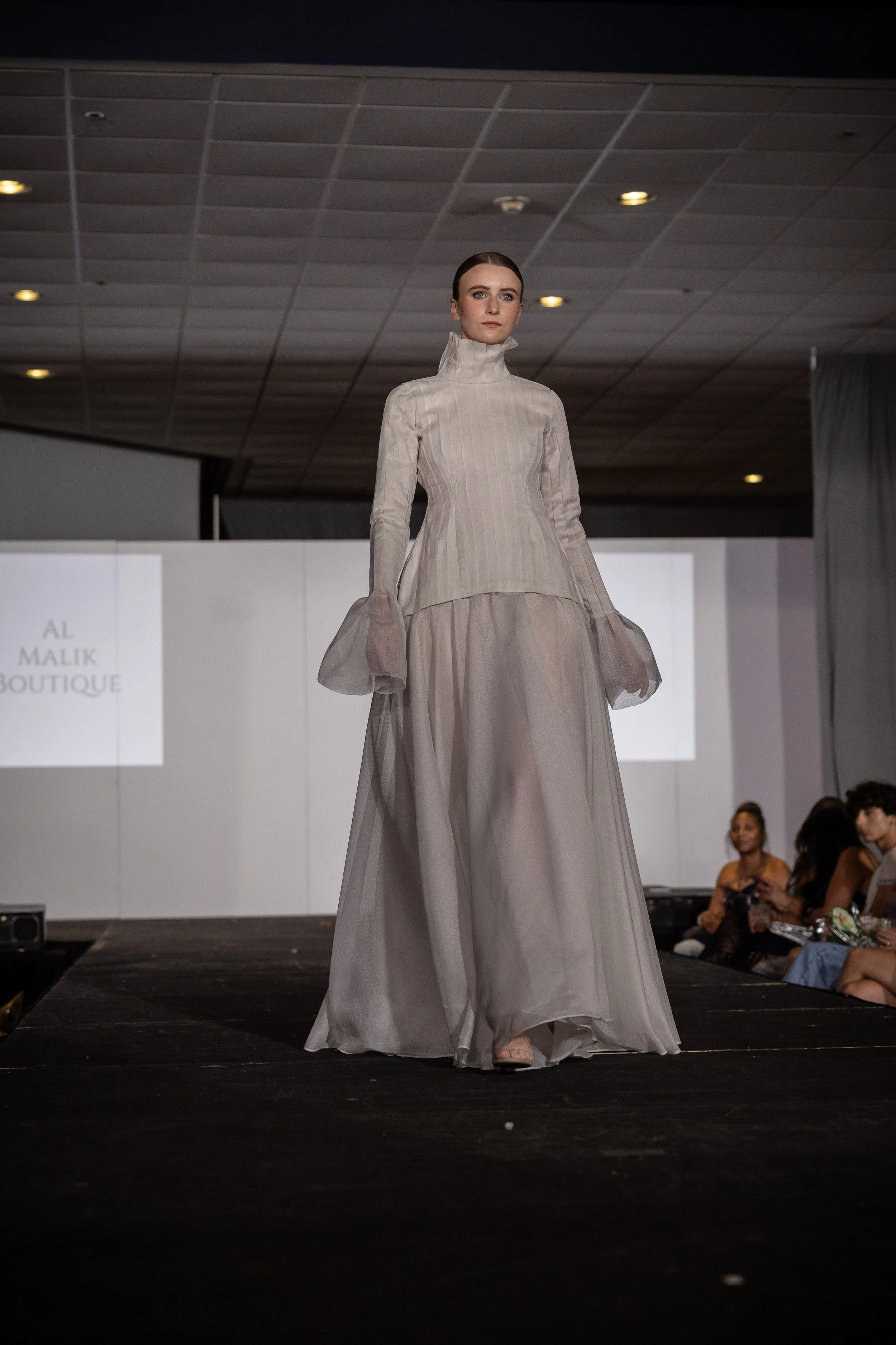 Al Malik Boutique | Travis Burke 