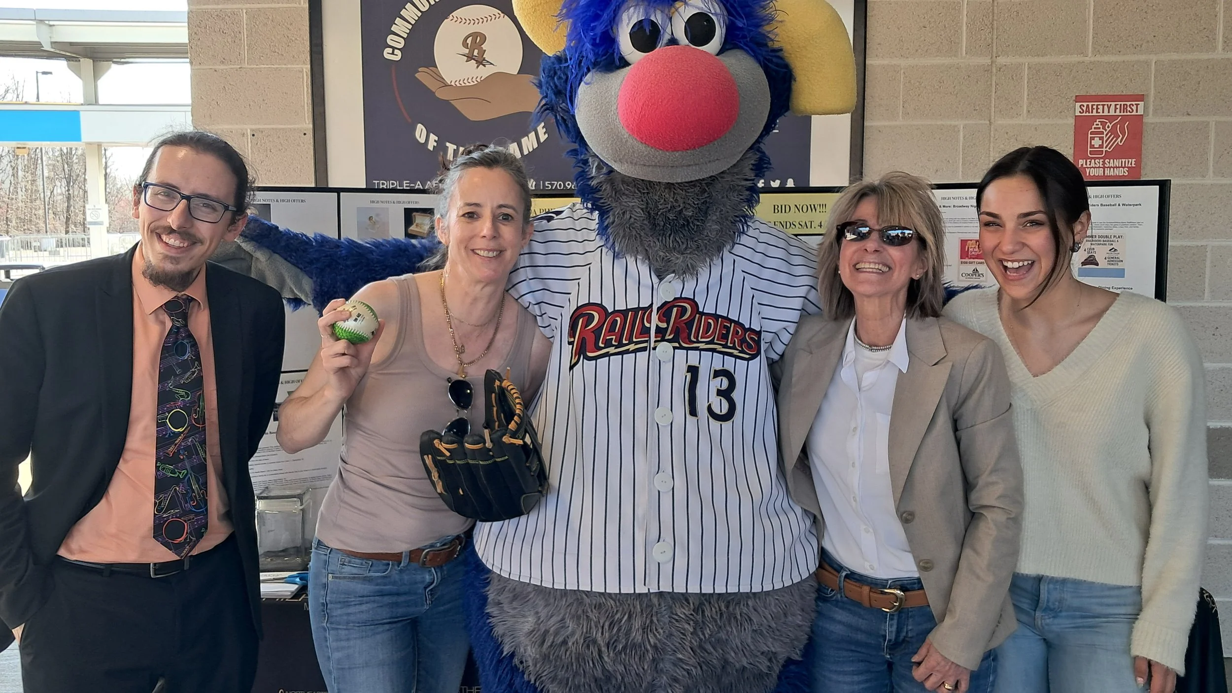 NEPA Philharmonic staff and Scranton/Wilkes-Barre Railriders mascot Champ