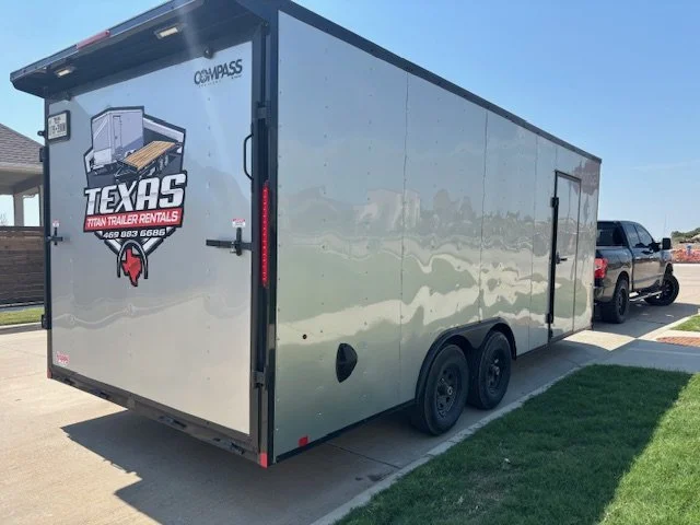 A large enclosed trailer parked on a driveway, with branding for Texas Titan Trailer Rentals, featuring a logo with a stylized trailer and text.